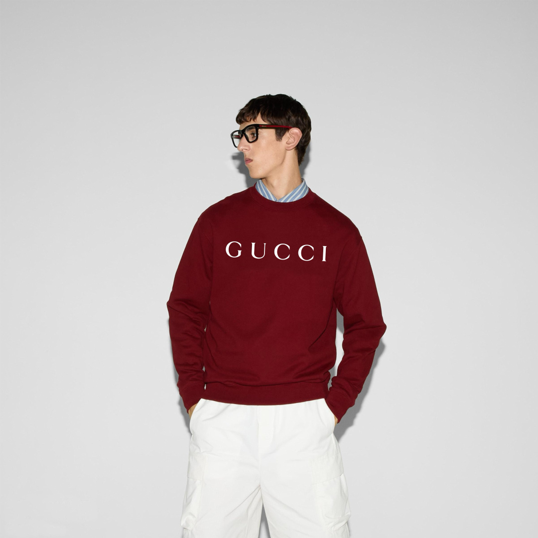 Gucci.古驰 25秋冬新品饰品牌字母GUCCI印花标识针织圆领卫衣，正面字母简约低调演绎品牌元素标识