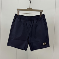 Dolce&Gabbana.杜嘉班纳 夏季经典金属皮牌徽标再生尼龙四分休闲短裤,正面左侧下摆饰有品牌经典标志性点缀 Do Dolce&Gabbana.杜嘉班纳 夏季经典金属皮牌徽标再生尼龙四分休闲短裤,正面左侧下摆饰有品牌经典标志性点缀 Do