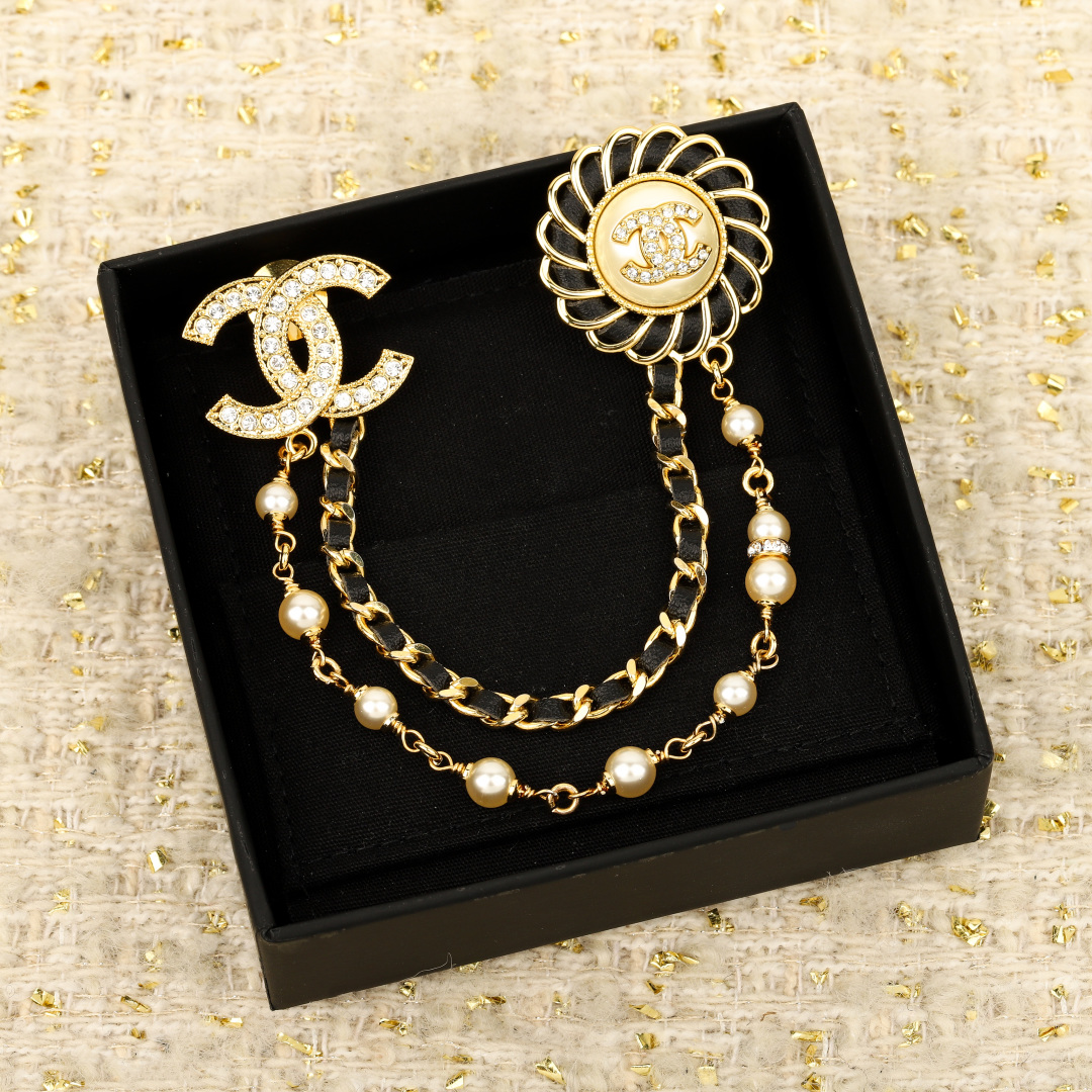 Chanel Gold-Tone Brooch with Leather and Pearls - Classic Design 3 cmp i1740703236743 8239 0 1