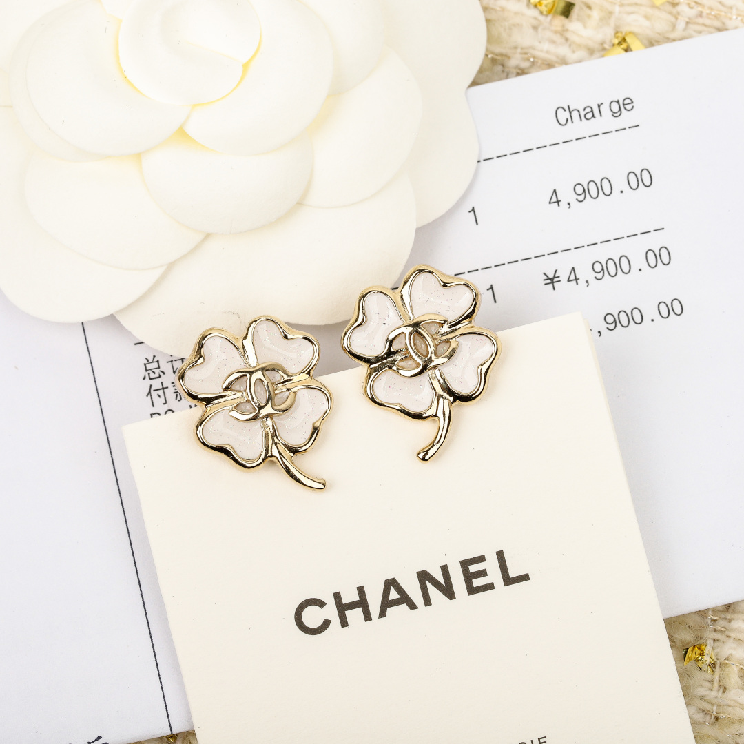 Chanel Clover Double C Earrings, Brass and Enamel, Gold and White 4 cmp i1740848299272 6382 0 2