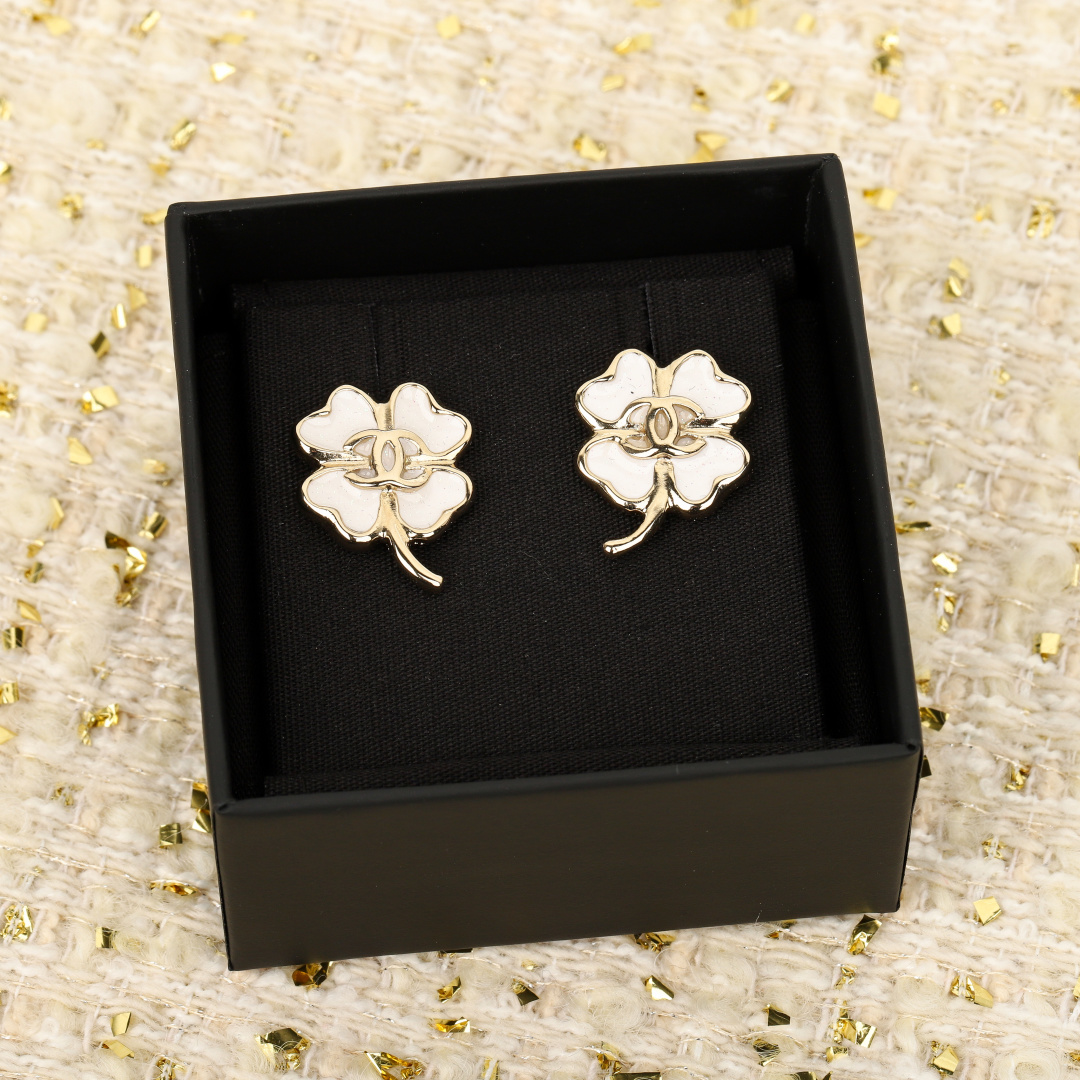 Chanel Clover Double C Earrings, Brass and Enamel, Gold and White 3 cmp i1740848299282 5907 0 1