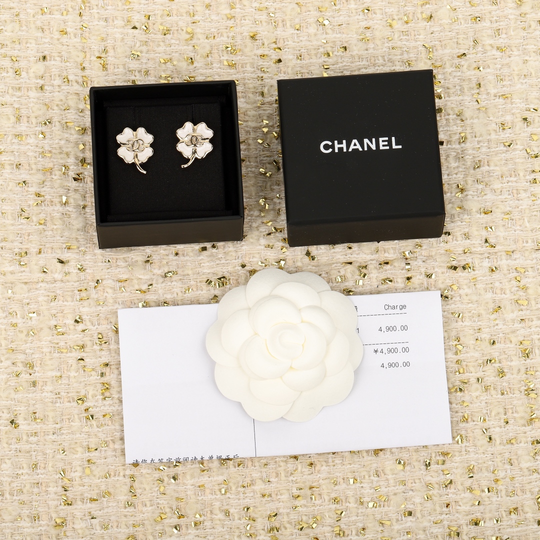Chanel Clover Double C Earrings, Brass and Enamel, Gold and White 2 cmp i1740848300345 1348 0 0