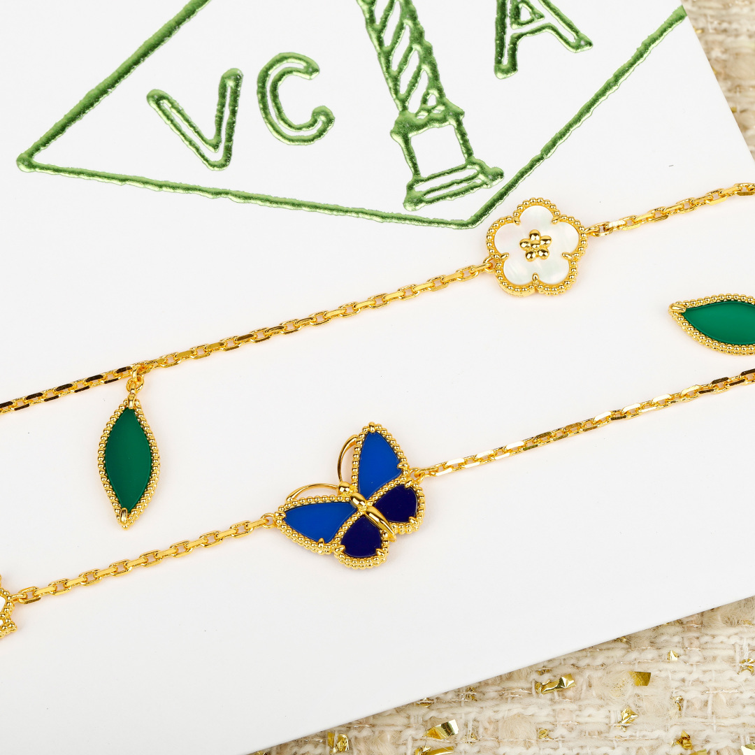 Van Cleef Arpels Lucky Spring necklace Yellow gold with green malachite white mother-of-pearl and blue lapis lazuli accents 80cm