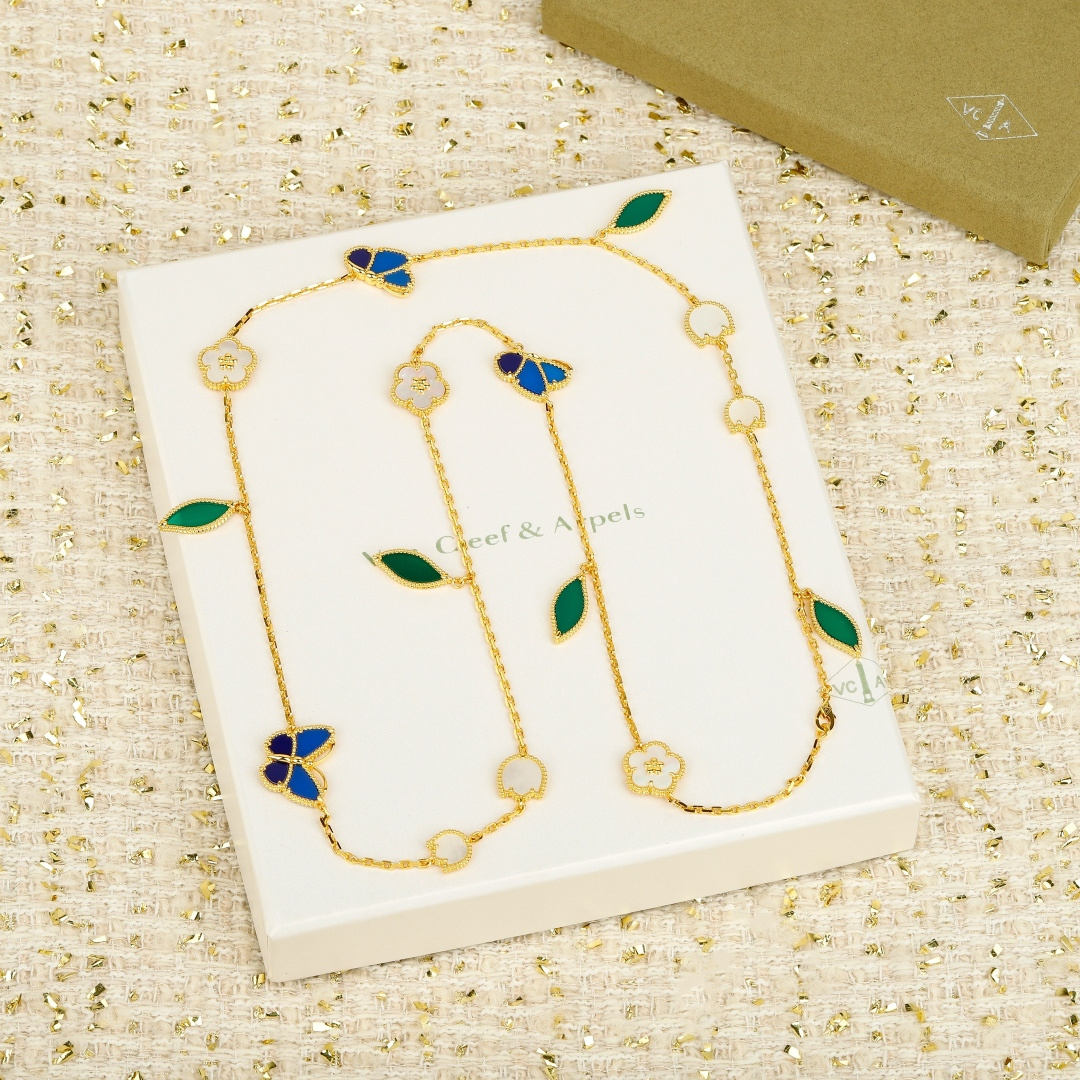 Van Cleef Arpels Lucky Spring necklace Yellow gold with green malachite white mother-of-pearl and blue lapis lazuli accents 80cm