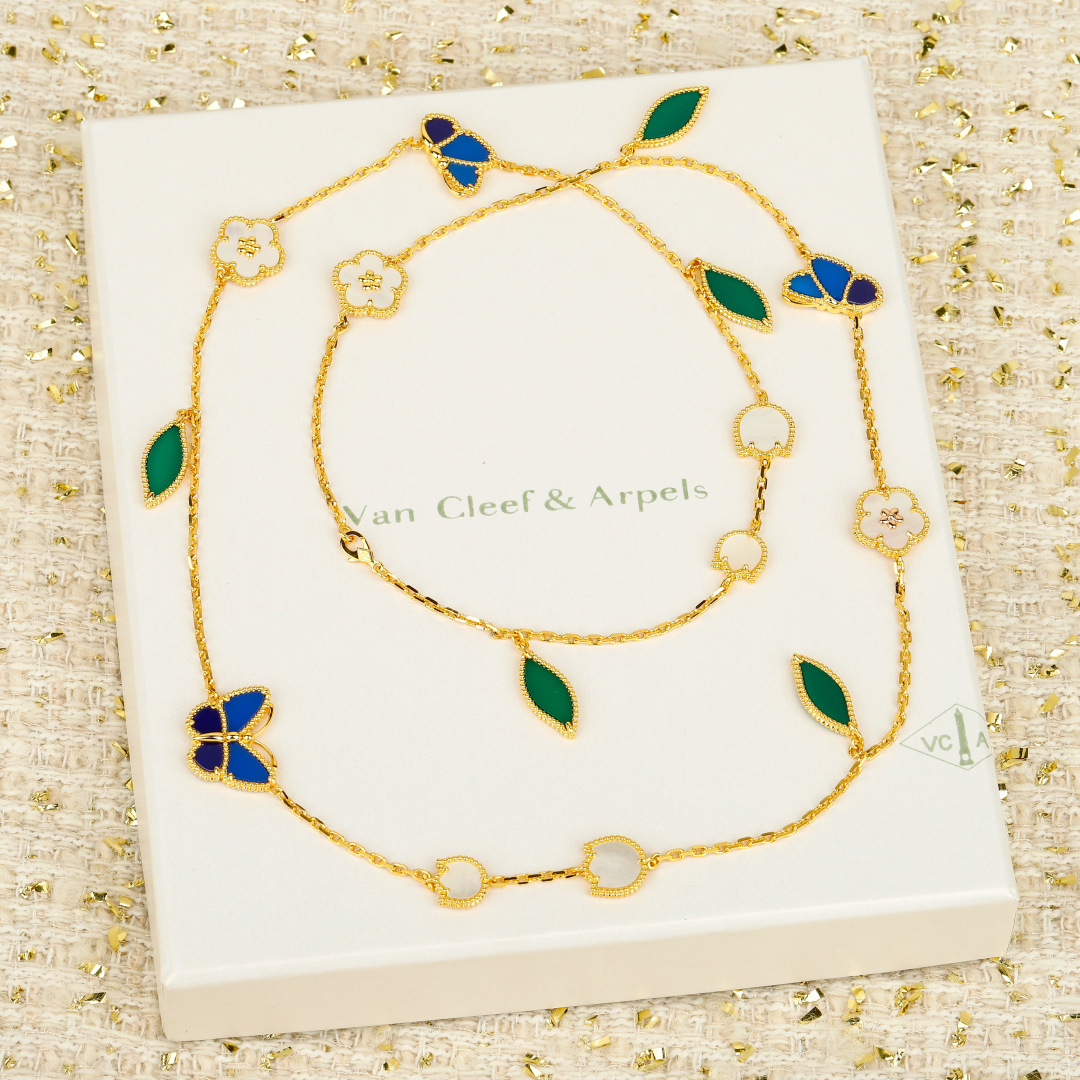 Van Cleef Arpels Lucky Spring necklace Yellow gold with green malachite white mother-of-pearl and blue lapis lazuli accents 80cm