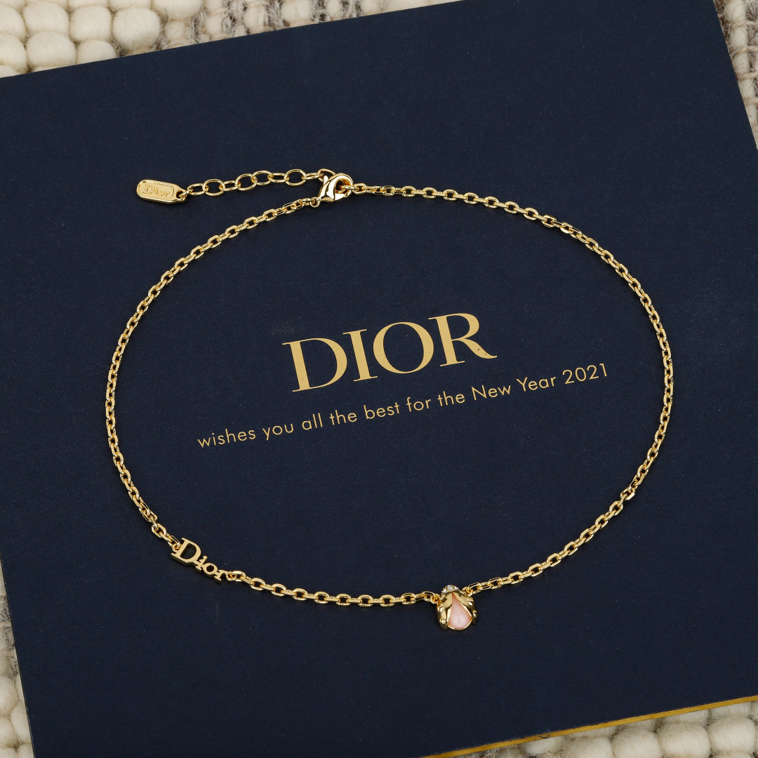 Dior 2021 New Year Ladybug necklace gold-tone metal with pink opalescent stone and clear crystal accent 42cm with 5cm extender