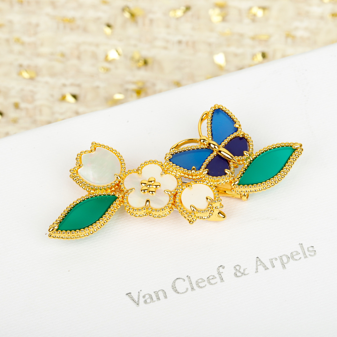 Van Cleef Arpels Four Seasons Flower Butterfly Brooch brooch Yellow gold metal white mother-of-pearl green malachite blue lapis lazuli and blue agate stones 3 5cm width