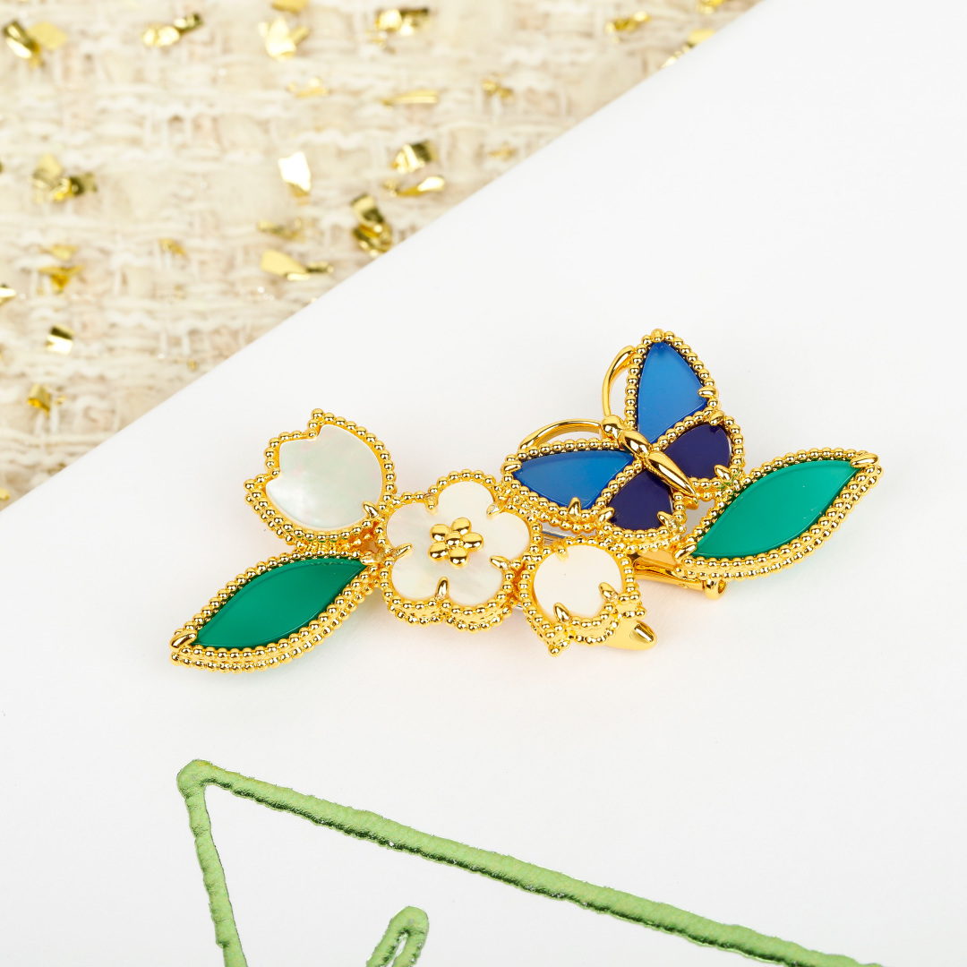 Van Cleef Arpels Four Seasons Flower Butterfly Brooch brooch Yellow gold metal white mother-of-pearl green malachite blue lapis lazuli and blue agate stones 3 5cm width