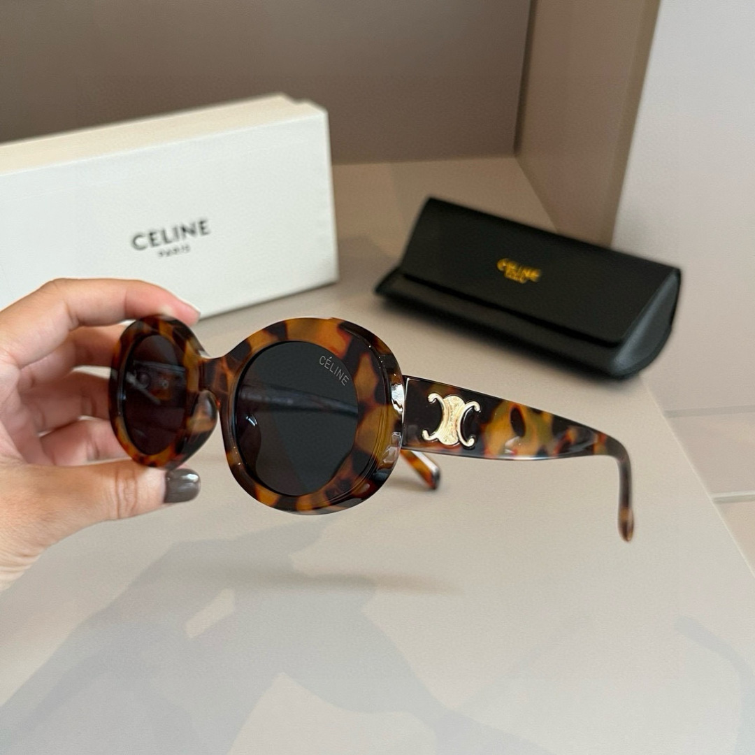 Солнцезащитные очки овальной формы Celine