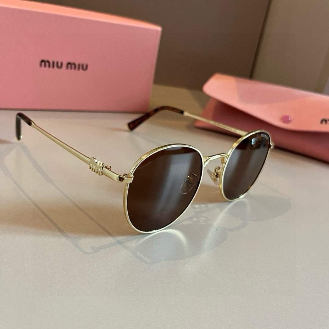 Óculos Miumiu ¥