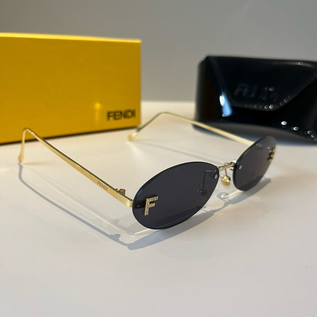 Солнцезащитные очки Fendi золотые