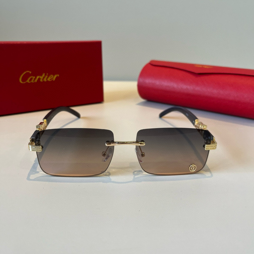 Солнечные очки без оправы с золотистым декором Cartier