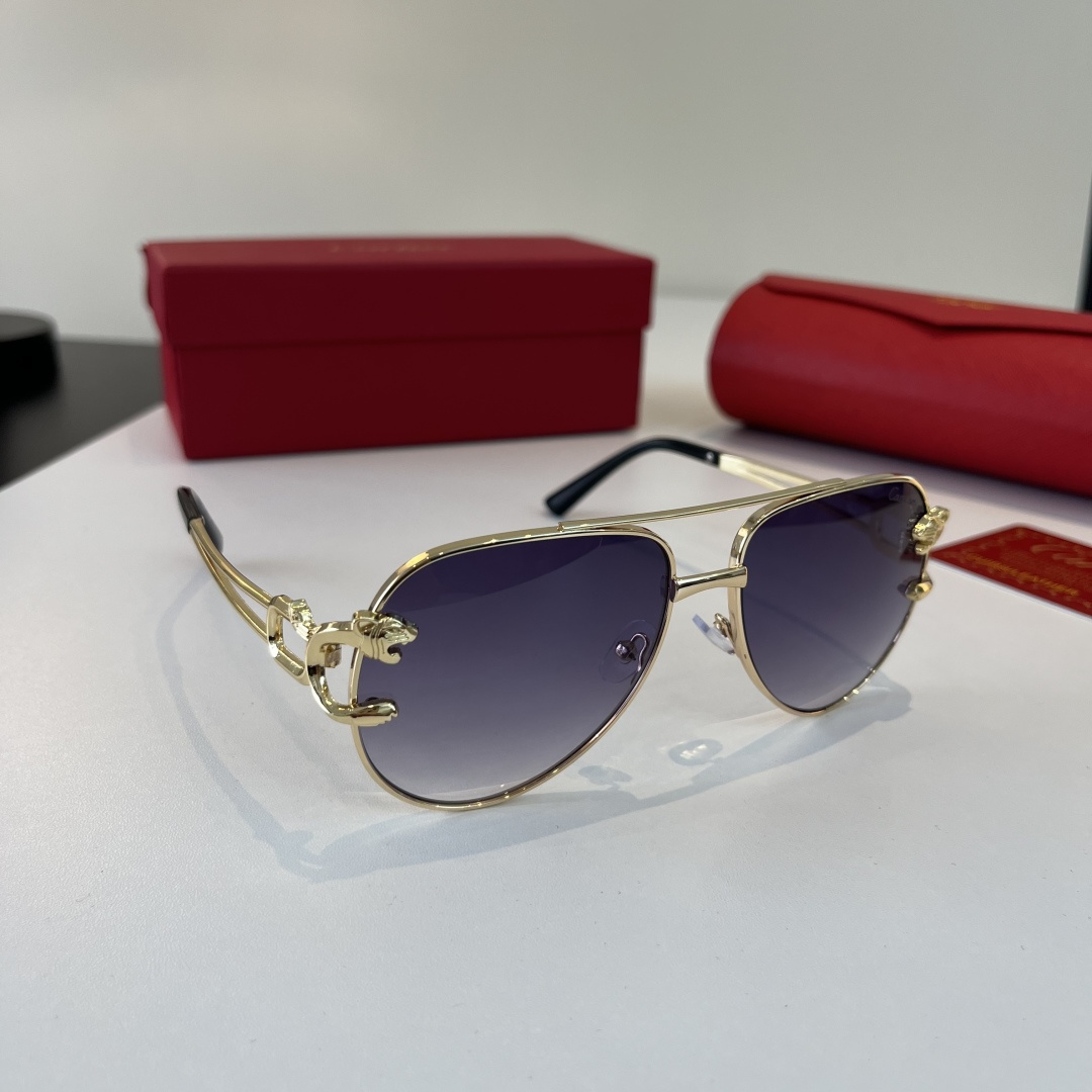 Солнечные очки в золотой оправе Cartier