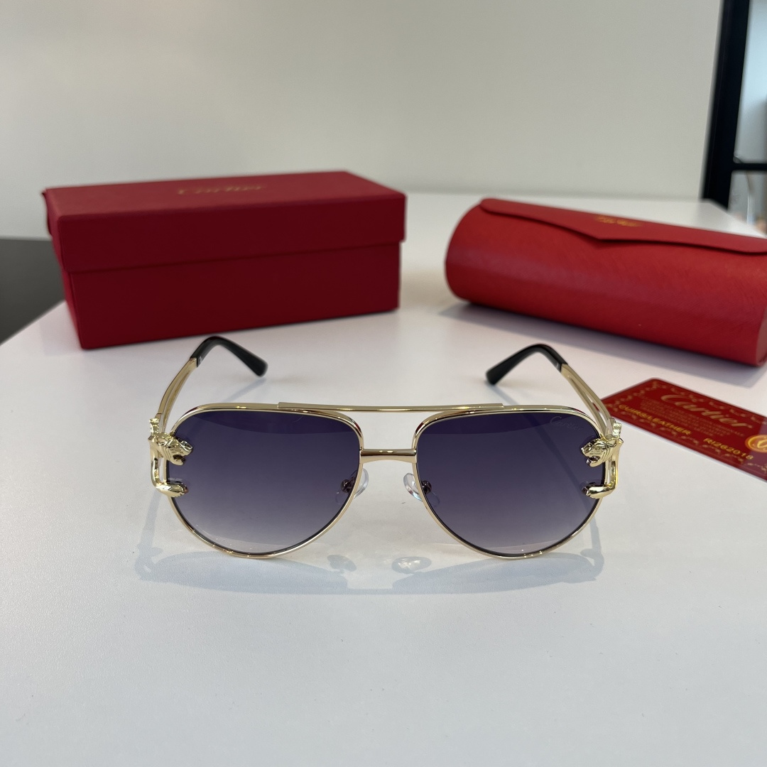 Солнечные очки в золотой оправе Cartier