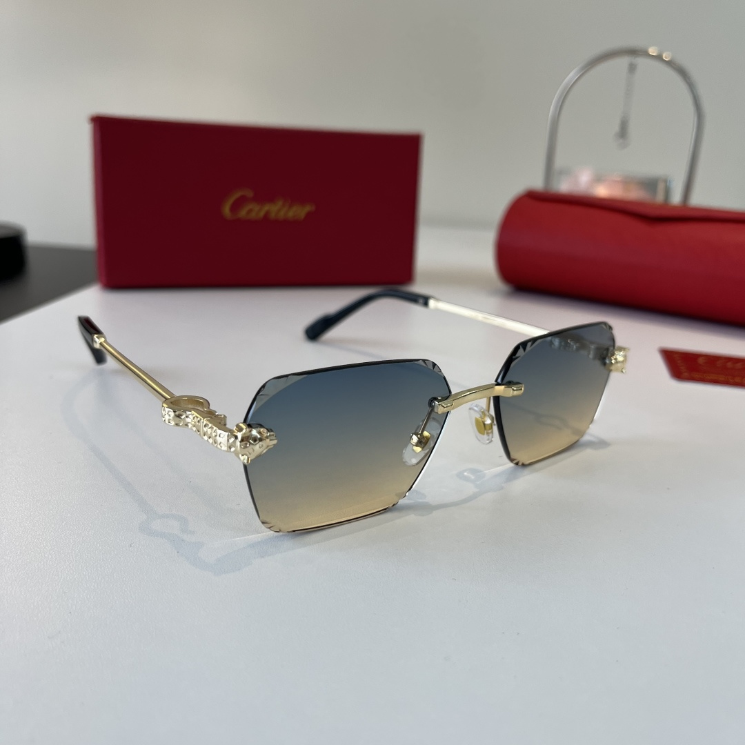 Солнечные очки без оправы золотистого цвета Cartier
