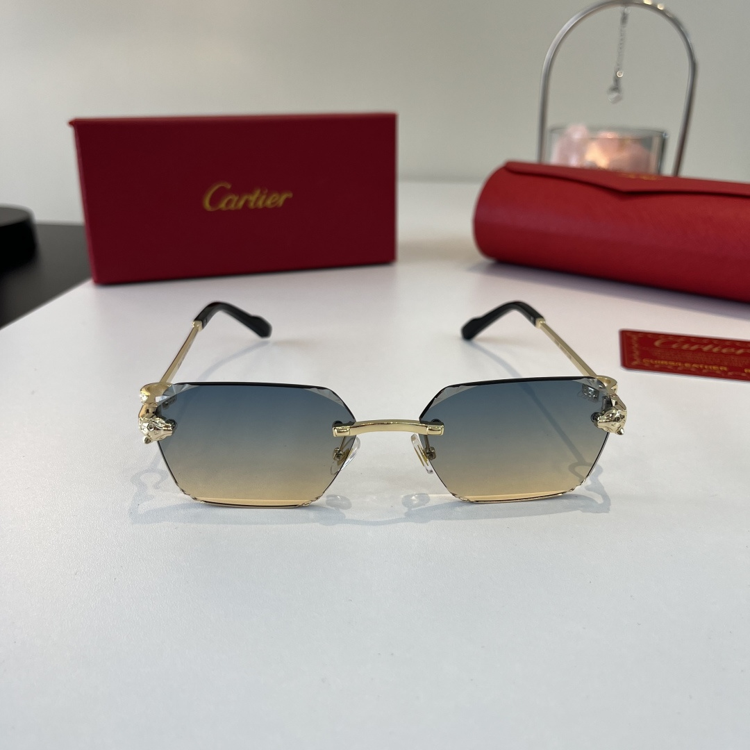 Солнечные очки без оправы золотистого цвета Cartier