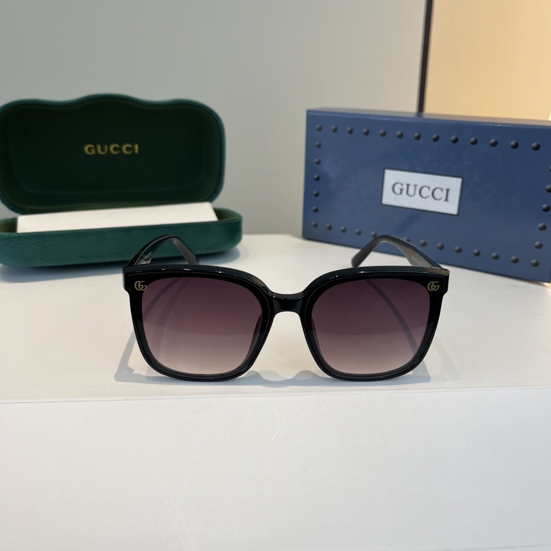 Солнцезащитные очки Gucci черные