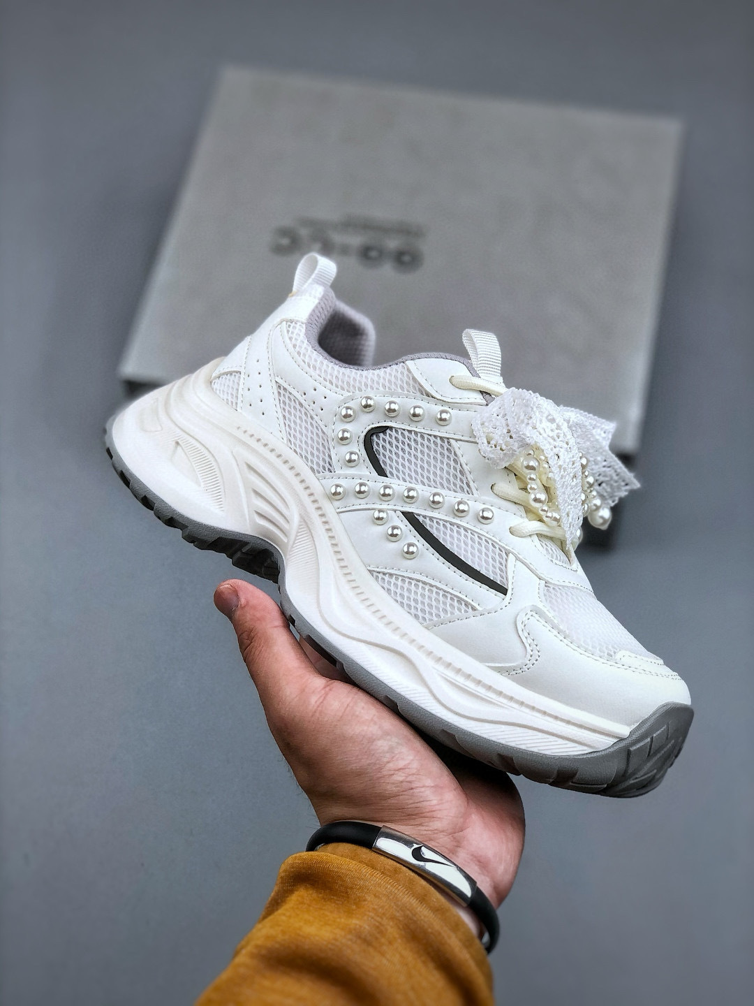 Gucci Chunky Low-Top Sneakers with Pearl Chain and Lace Detail - Stylish and Chic