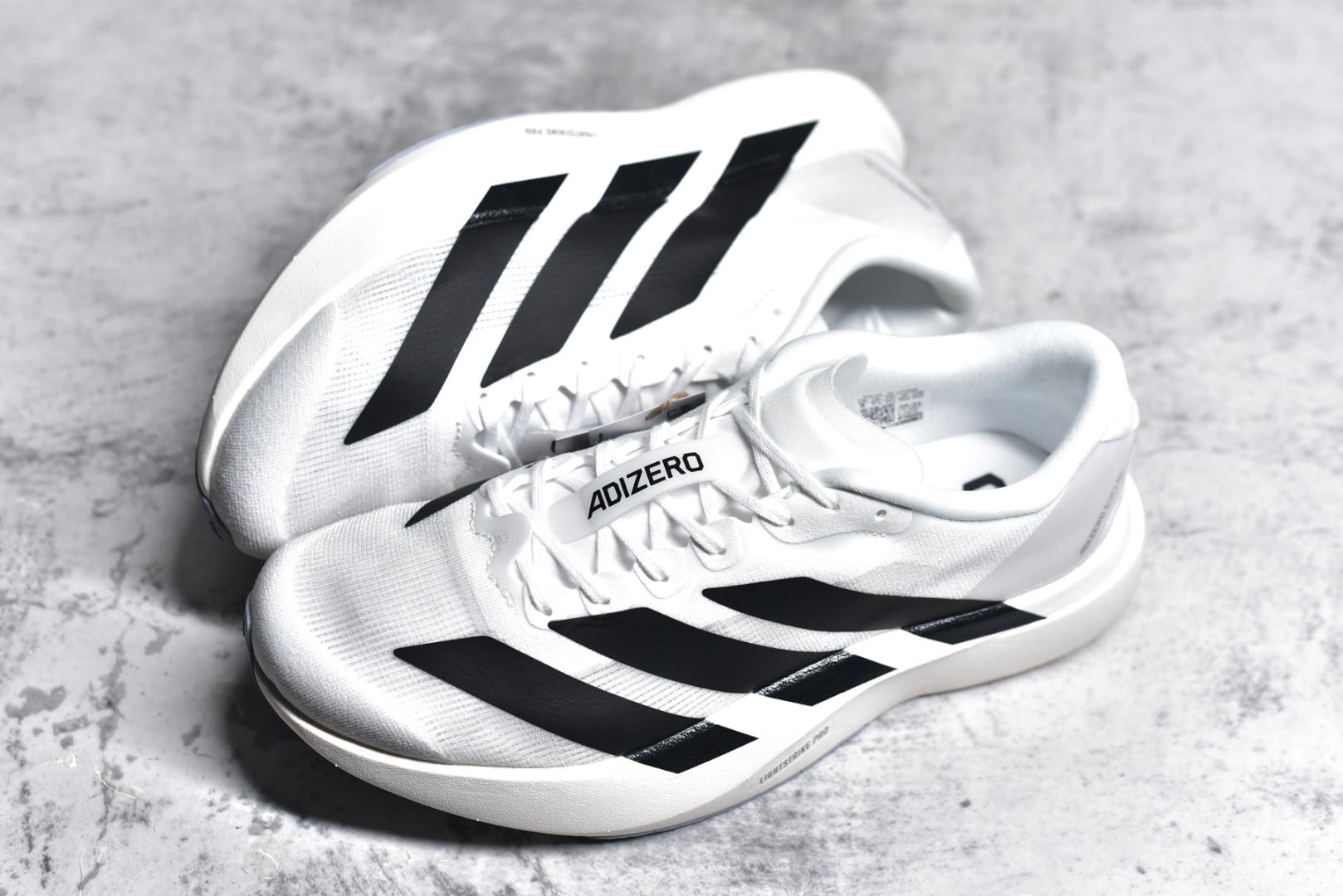 图片[7]-#AD Adizero Evo SL JH6206 阿迪超轻透气缓震跑鞋 #以令人难以置信的138克重量，刷新了跑鞋轻量化的记录，阿迪在材料科学和工艺技术上的深厚积累。 #全新鞋款采用Lightweight Upper材料，让穿着者几乎能够体验到一种\”裸足\”的感觉 尺码：39 40 40.5 41 42 42.5 43 44 44.5 45-选品中心