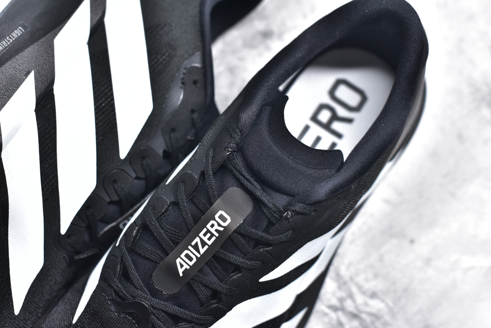图片[9]-#AD Adizero Evo SL JH6206 阿迪超轻透气缓震跑鞋 #以令人难以置信的138克重量，刷新了跑鞋轻量化的记录，阿迪在材料科学和工艺技术上的深厚积累。 #全新鞋款采用Lightweight Upper材料，让穿着者几乎能够体验到一种\”裸足\”的感觉 尺码：39 40 40.5 41 42 42.5 43 44 44.5 45-选品中心