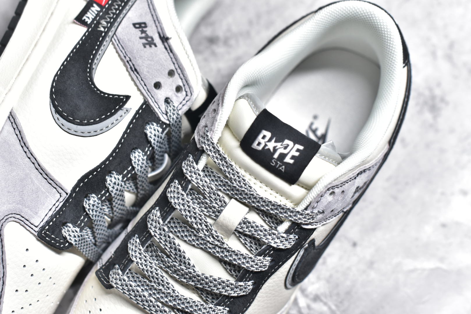 图片[9]-#NK SB Dunk Low x BAPE 白灰黑双钩满天星 纯原大厂出品 极力推荐👏 原装头层材料 独家版型蒸餾加工 帶來的是更好的视觉和脚感体验 大厂纯原品质出货 清洁度 电绣工艺 皮料切割干净无任何毛边 细节完美 货号：DM6868 031XK 尺码：36 36.5 37.5 38 38.5 39 40 40.5 41 42 42.5 43 44 44.5 45-选品中心