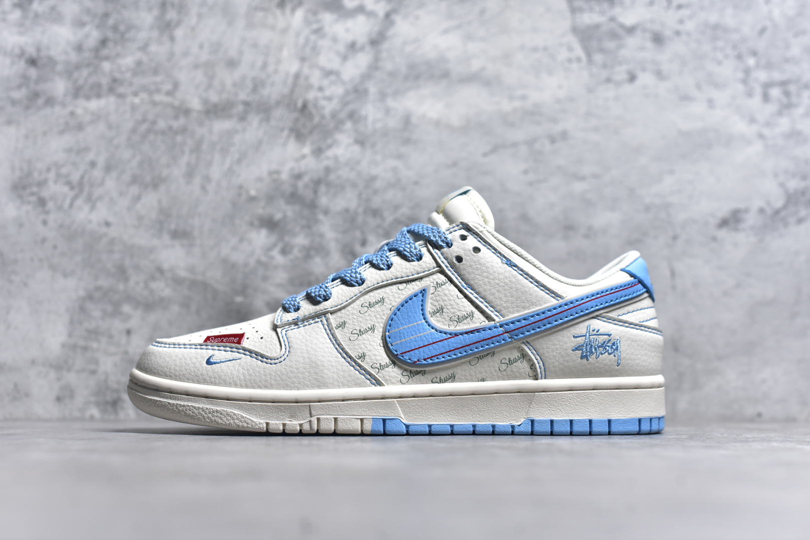 #Nike SB Dunk Low 斯图西联名 双拼蓝线 周年高端定制 低帮休闲板鞋 XS6089-534 #定制鞋盒 大厂纯原品质出货 超高清洁度 皮料切割干净无任何毛边 细节完美 尺码：36 36.5 37.5 38 38.5 39 40 40.5 41 42 42.5 43 44 44.5 45 9.E5-选品中心