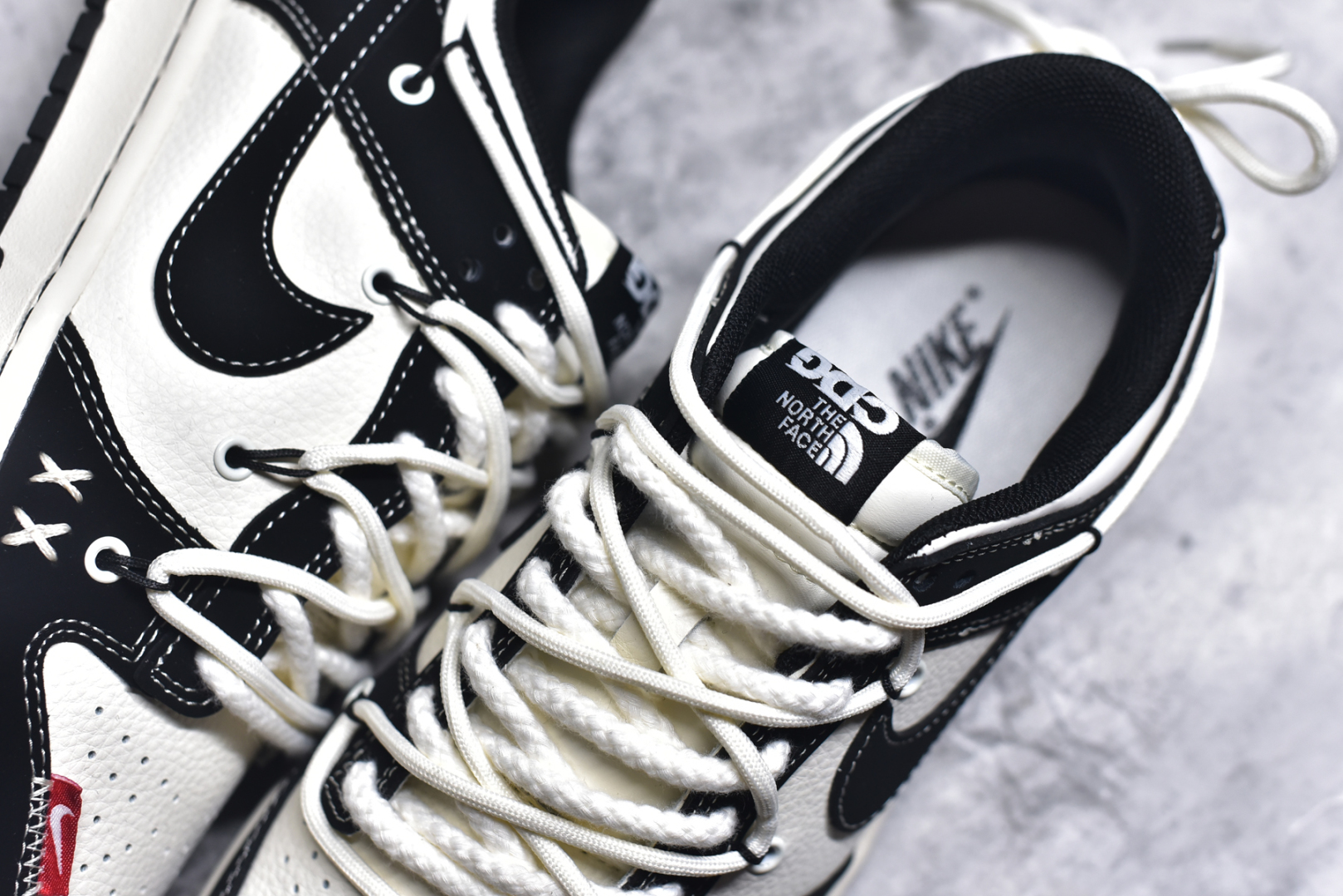 图片[9]-#Nike SB Dunk Low 北面系列 绑带黑白黑勾 周年高端定制 低帮休闲板鞋 YX5066-287 #定制鞋盒 大厂纯原品质出货 超高清洁度 皮料切割干净无任何毛边 细节完美 尺码：36 36.5 37.5 38 36.5 39 40 40.5 41 42 42.5 43 44 44.5 45 9.E5-选品中心