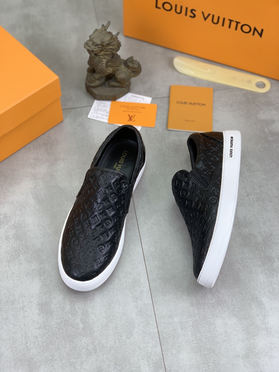 Louis Vuitton Men's Black Leather Monogram Embossed Slip-On Sneakers 18 cmp i1743269189913 7050 0 2