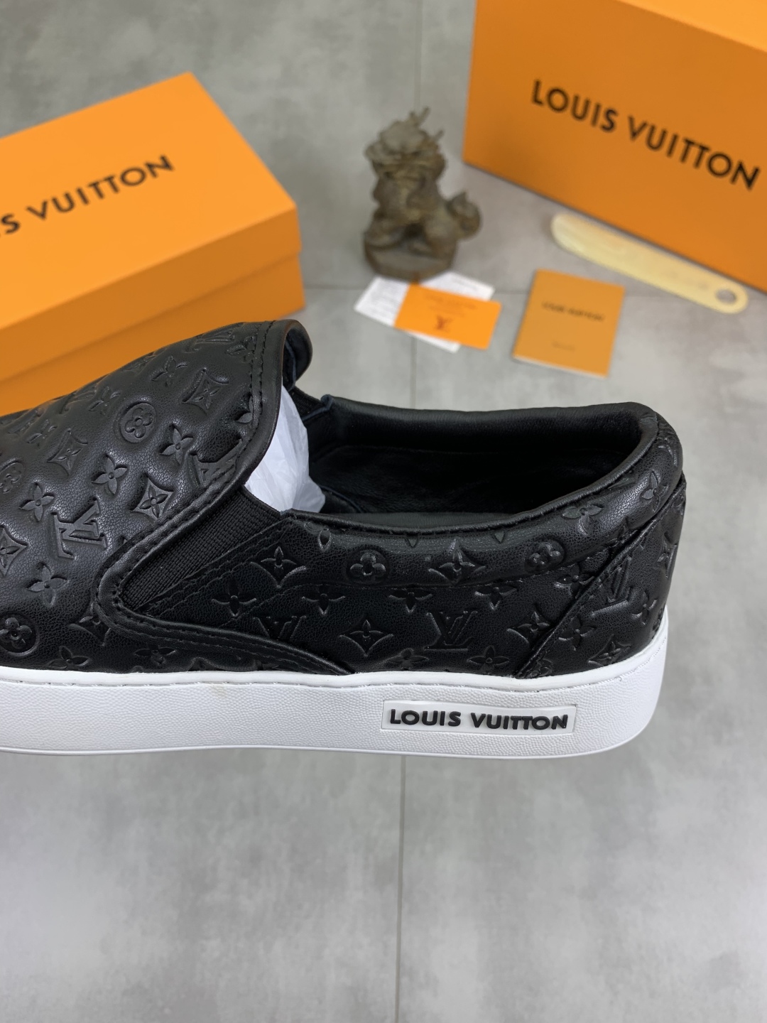 Louis Vuitton Men's Black Leather Monogram Embossed Slip-On Sneakers 22 cmp i1743269194972 3665 0 6