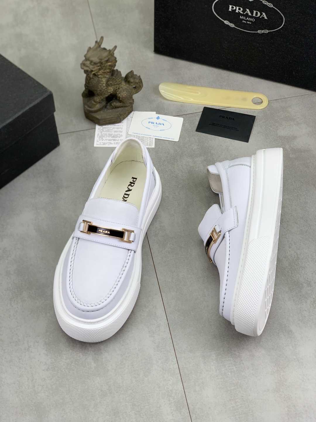 Prada Men's Classic White Leather Loafers with Signature Buckle Detail 4 cmp i1745598658705 3062 0 2