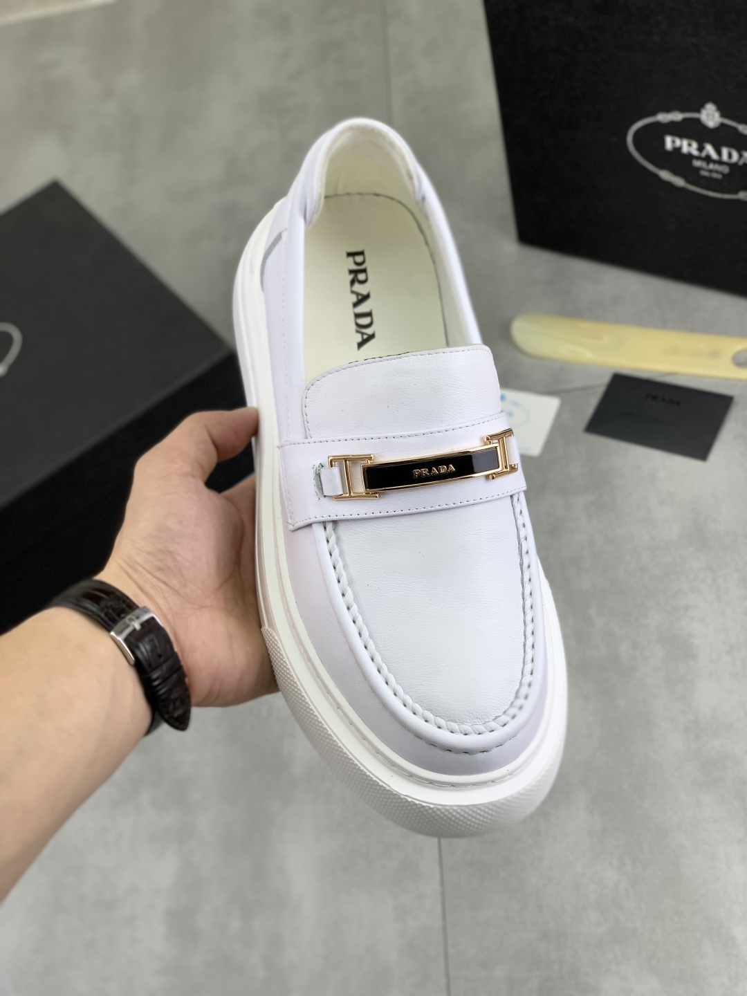 Prada Men's Classic White Leather Loafers with Signature Buckle Detail 2 cmp i1745598658705 7687 0 0