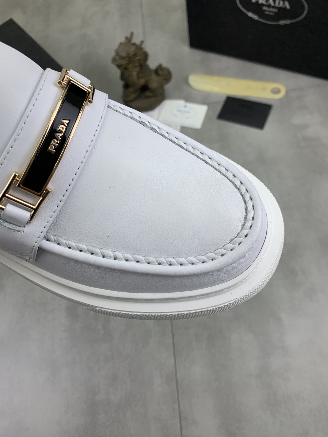 Prada Men's Classic White Leather Loafers with Signature Buckle Detail 6 cmp i1745598659967 5204 0 4
