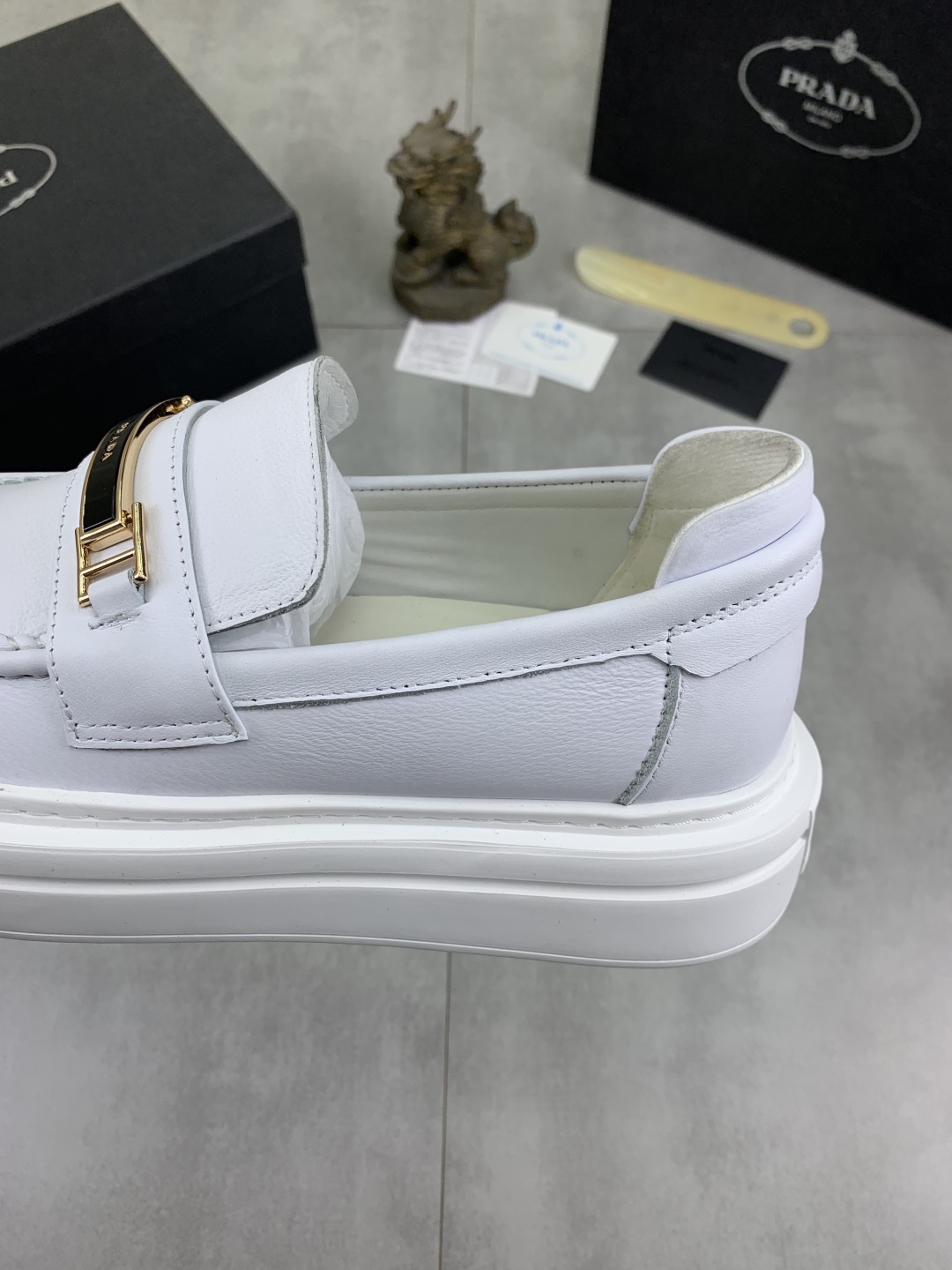 Prada Men's Classic White Leather Loafers with Signature Buckle Detail 8 cmp i1745598660022 735 0 6