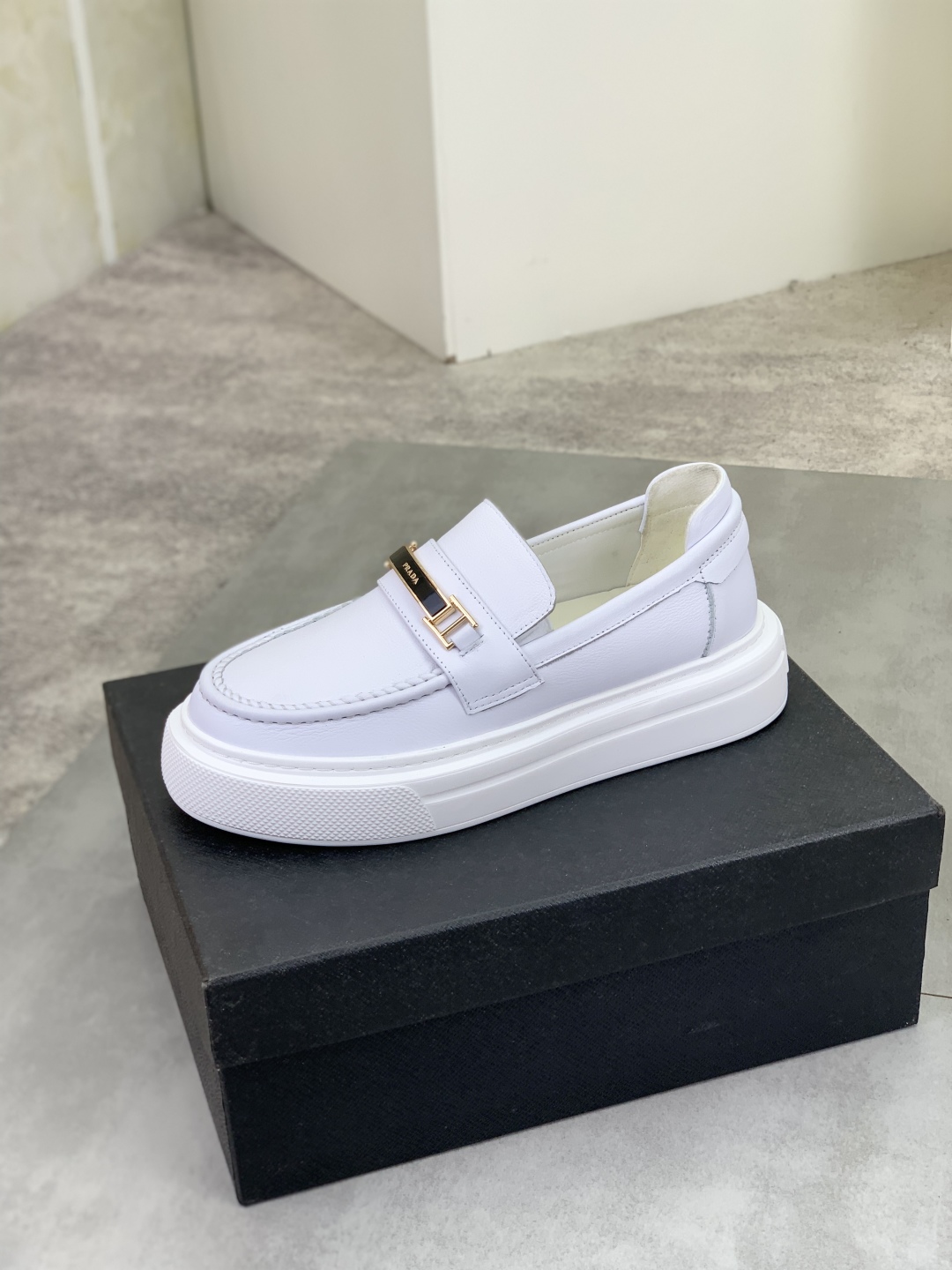 Prada Men's Classic White Leather Loafers with Signature Buckle Detail 5 cmp i1745598662889 5259 0 3
