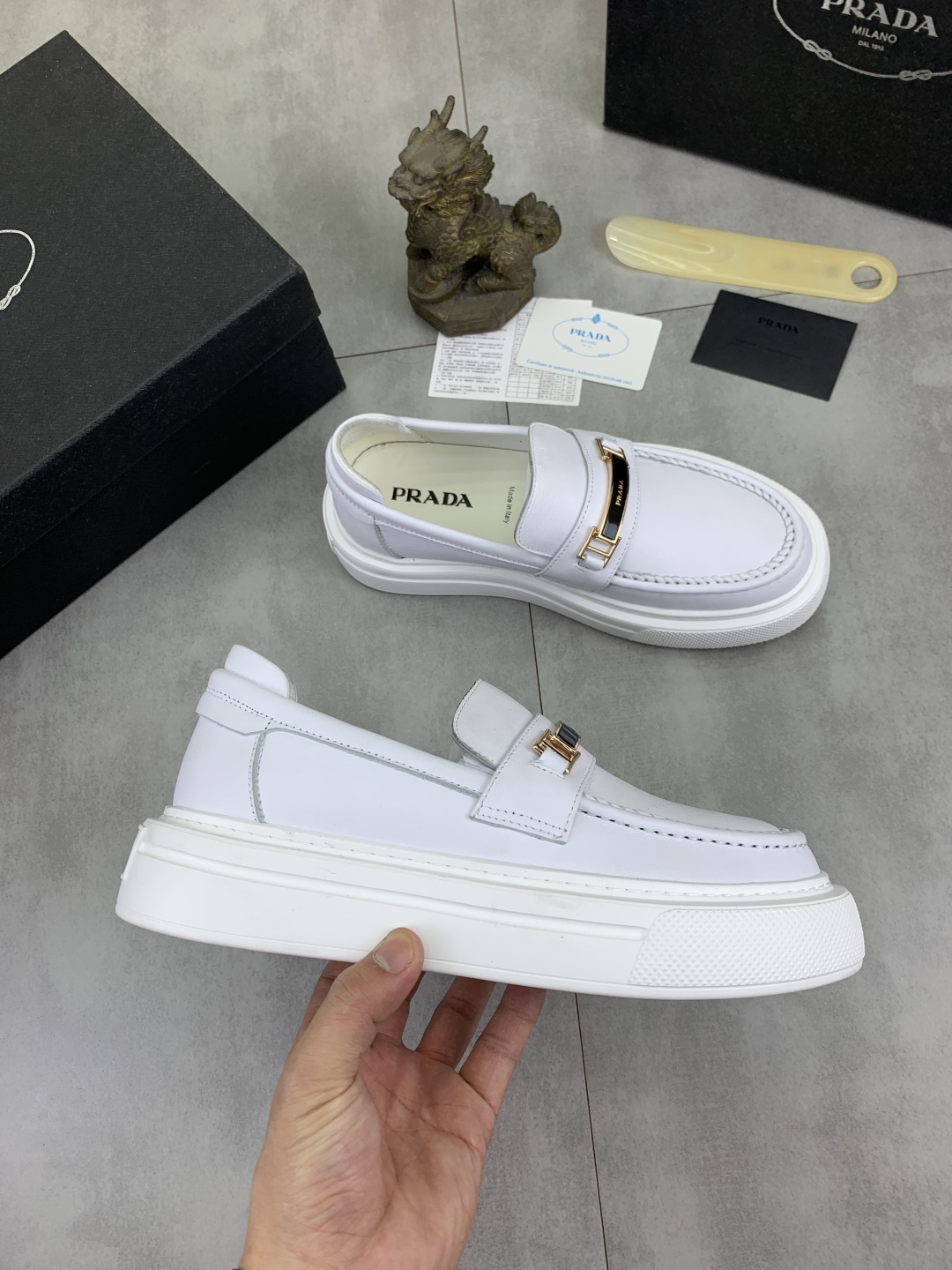 Prada Men's Classic White Leather Loafers with Signature Buckle Detail 7 cmp i1745598663590 5768 0 5
