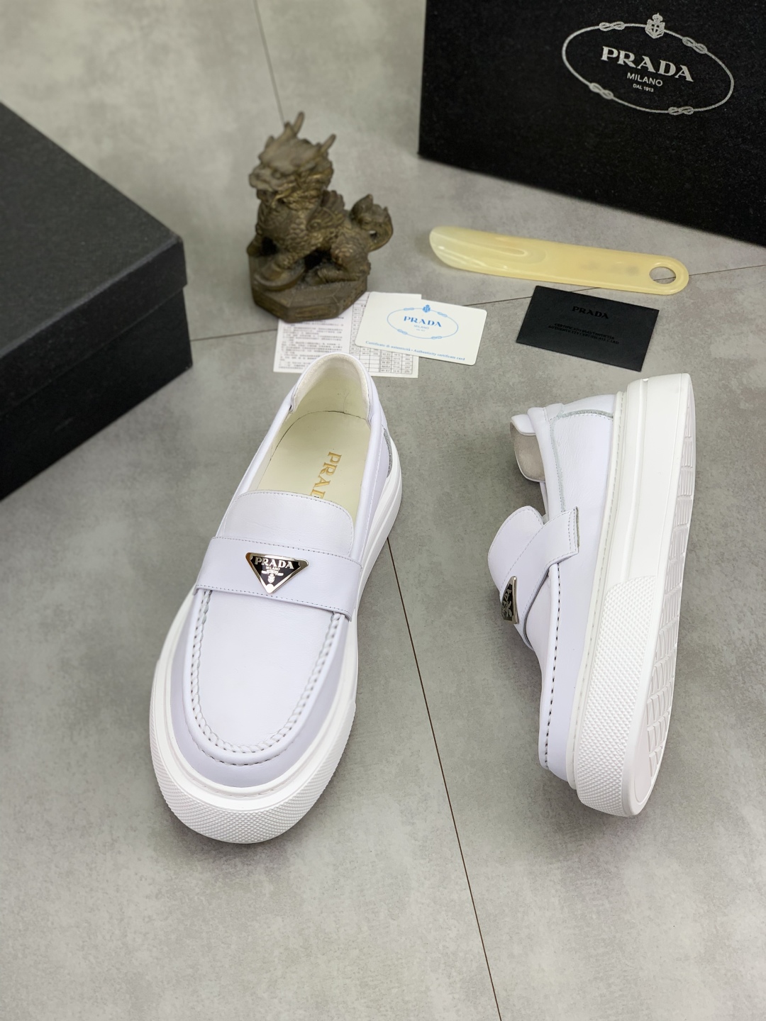 Prada Men's White Leather Loafers with Iconic Logo and Comfortable Fit 4 cmp i1745598772722 9640 0 2