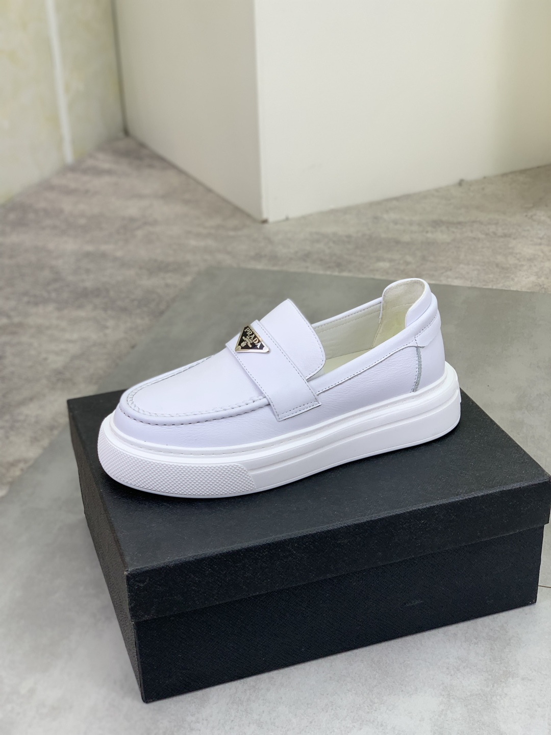 Prada Men's White Leather Loafers with Iconic Logo and Comfortable Fit 5 cmp i1745598772731 2468 0 3