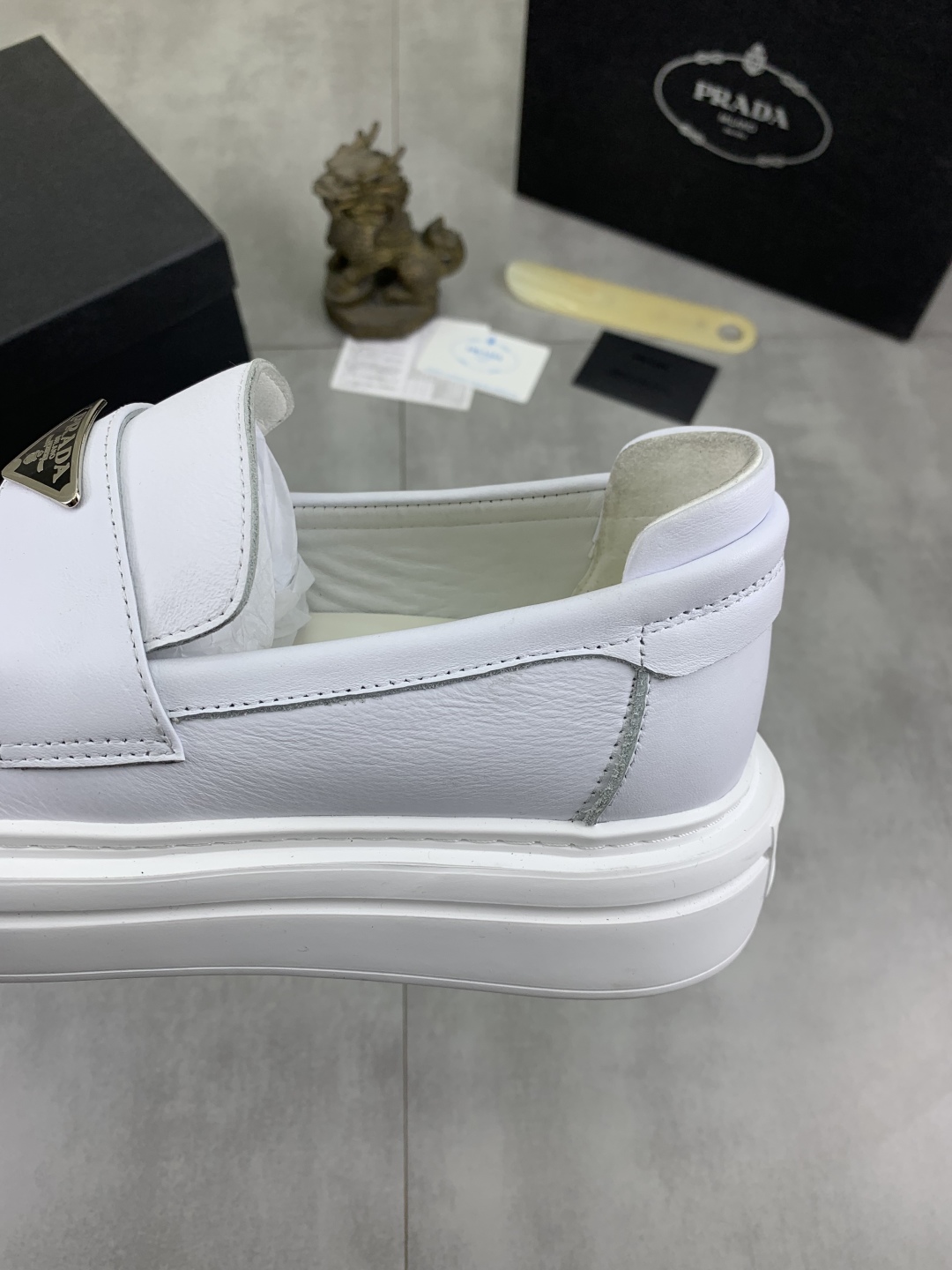 Prada Men's White Leather Loafers with Iconic Logo and Comfortable Fit 8 cmp i1745598775838 2724 0 6