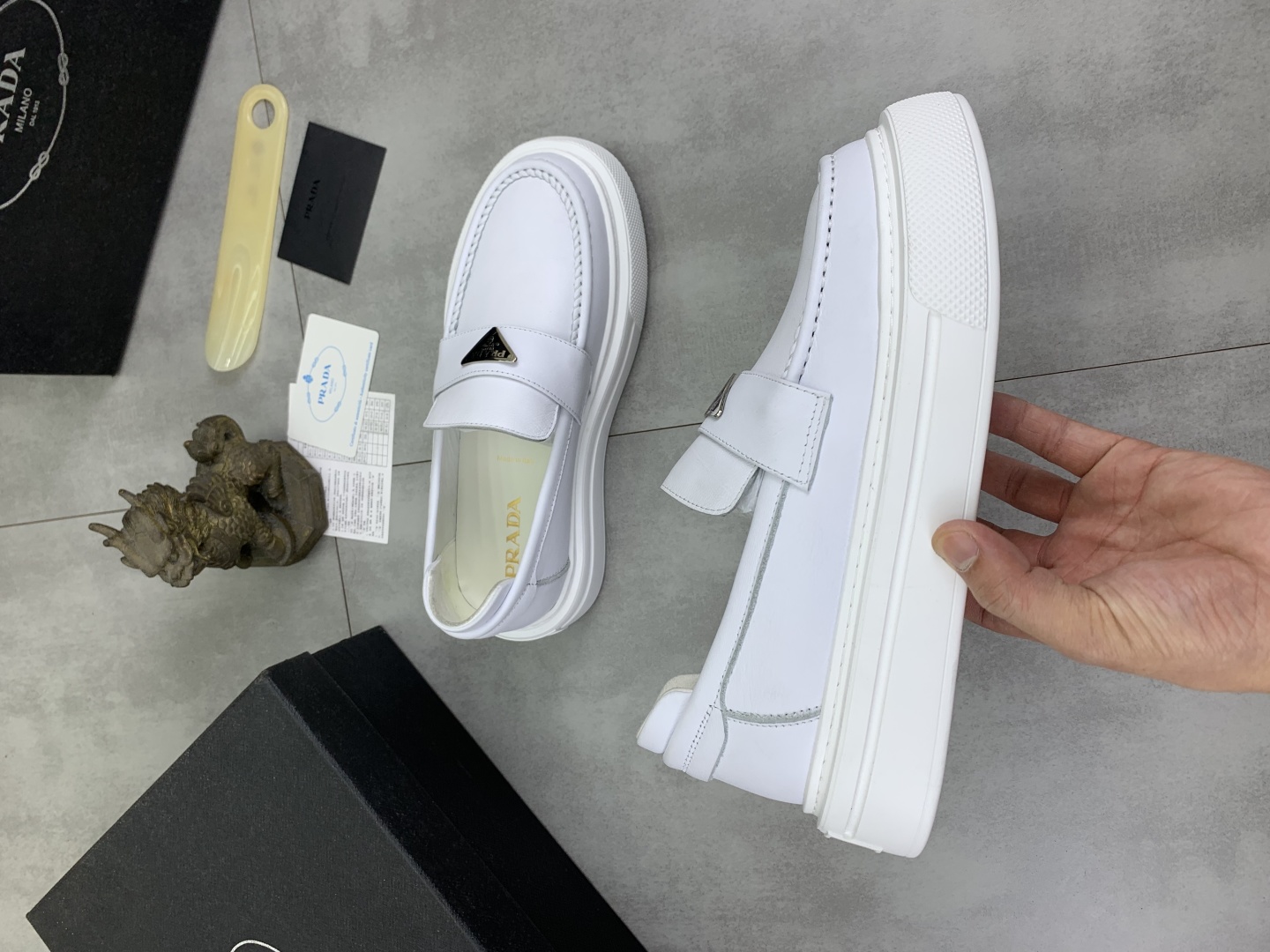 Prada Men's White Leather Loafers with Iconic Logo and Comfortable Fit 7 cmp i1745598782224 4376 0 5