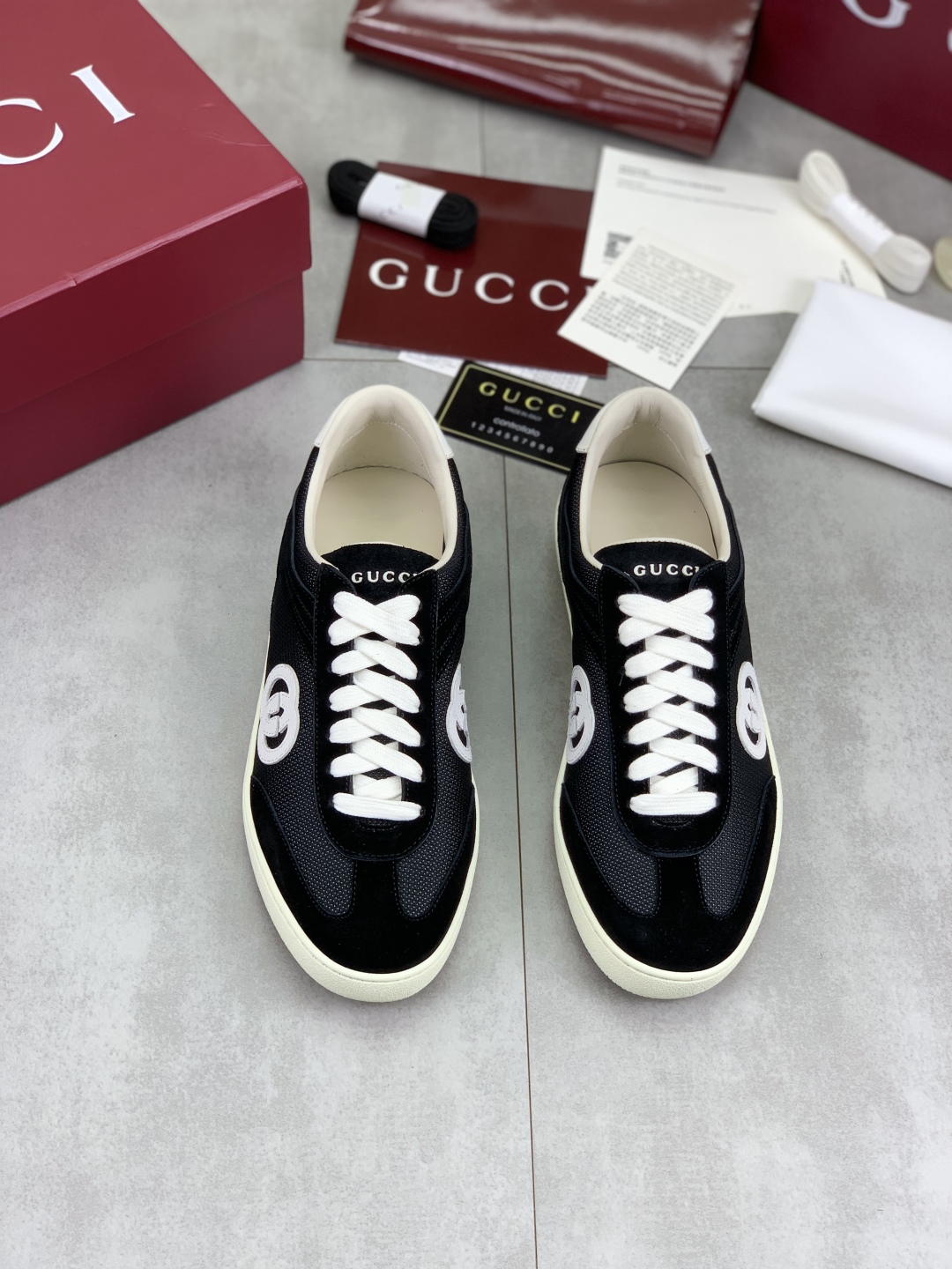 Gucci Women's Black Logo Canvas Sneakers, Lightweight and Comfortable 3 cmp i1746378475741 297 0 1