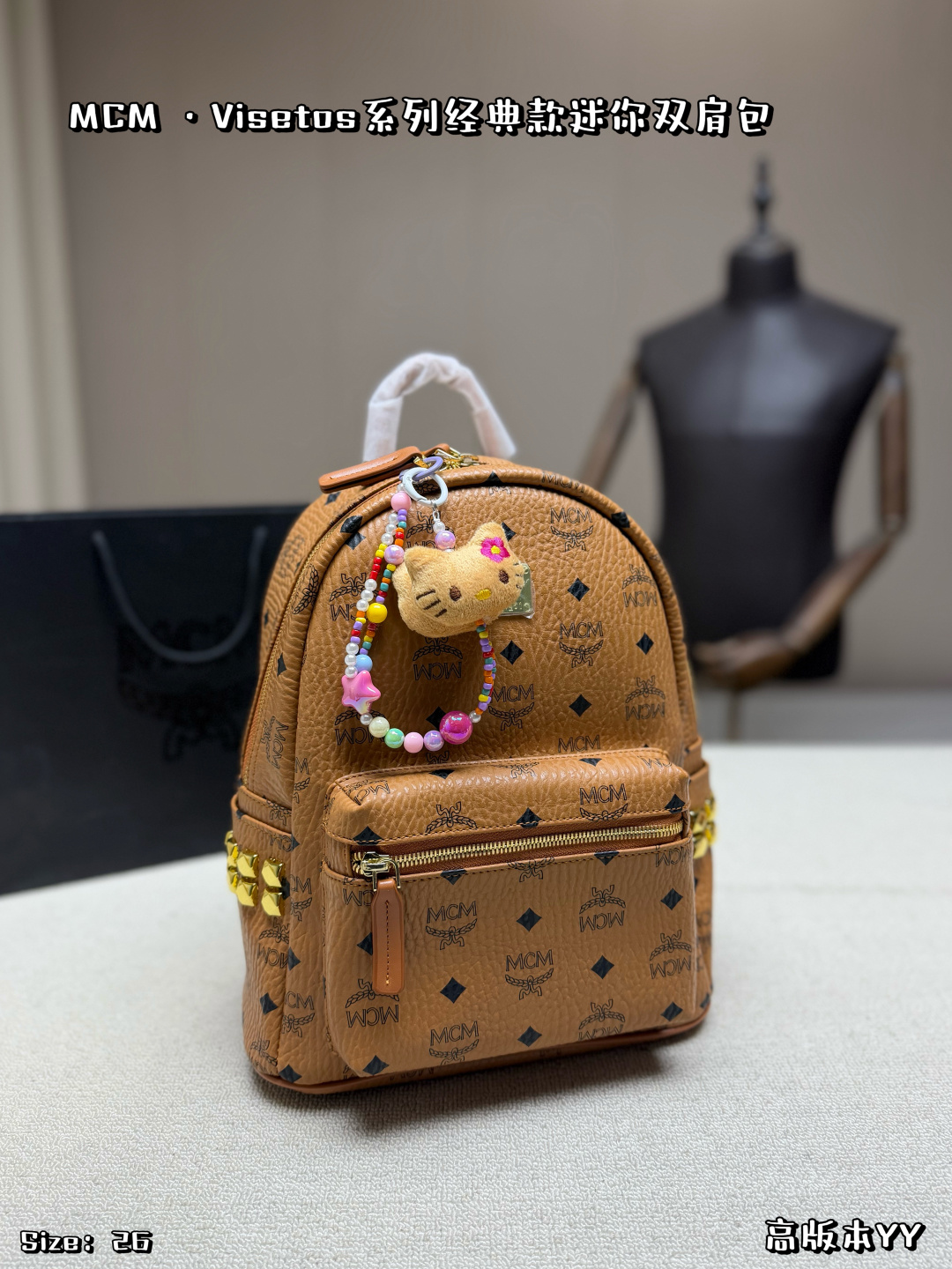 P160, sin caja, con colgante ✨MCM Visetos mini mochila, clásico estampado de color coñac, con cremallera metá…