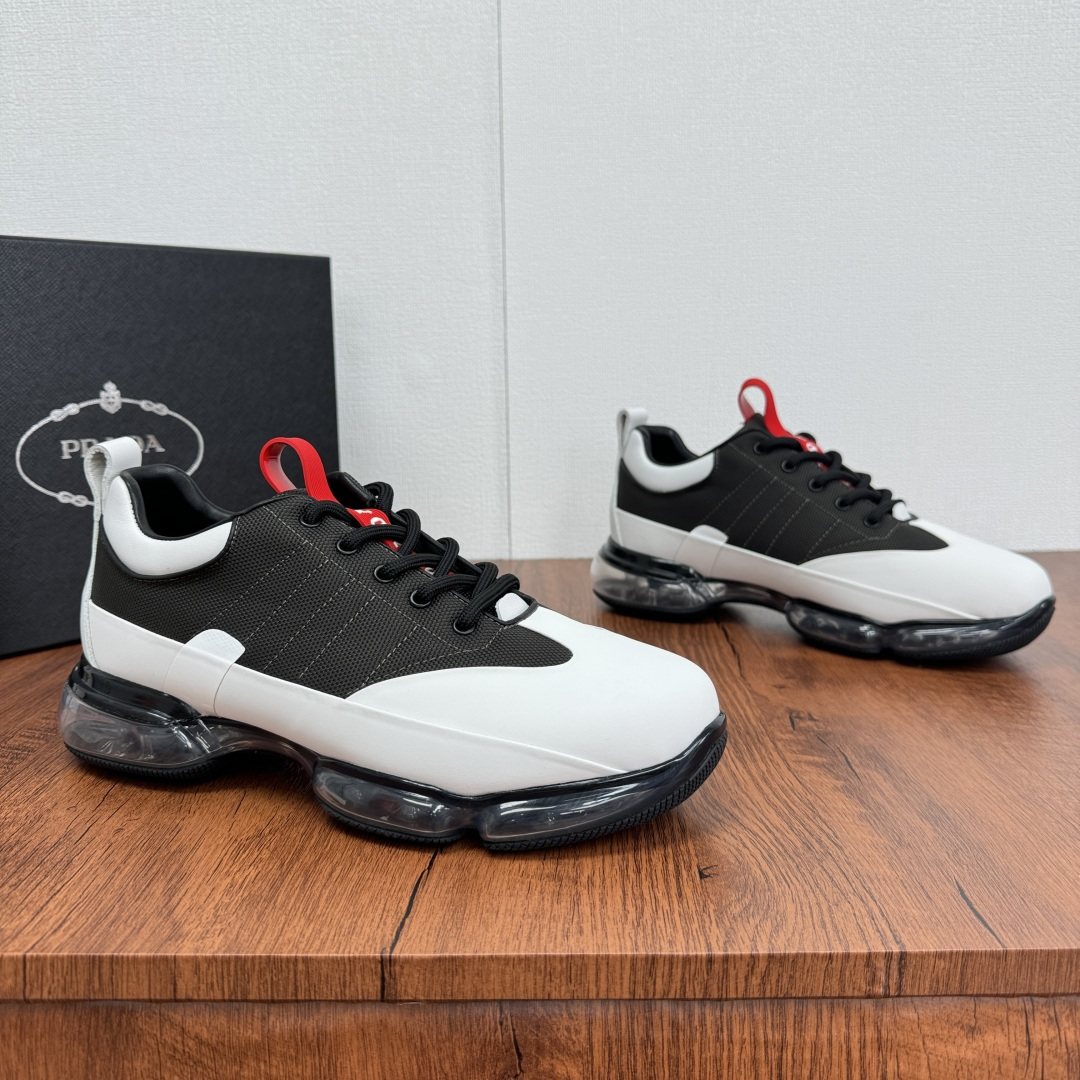 NO:278194,Code Prada/Prada Men's new spring and summer air cushion shoes, thick-soled casual shoes shipped, a perfect fusion of luxury and practicality. This Prada sports shoes show the ingenious craftsmanship. The classic Prada air cushion sole, paired with an anti-slip plaid rubber bottom, not only provides excellent cushioning, but also makes it more stable when walking, without fear of slipperyness. The upper uses calfskin splicing technology mesh, which has a high texture and a technological mesh. The forefoot breathable mesh design keeps the feet dry at all times. The inner part is soft calfskin, which fits the skin. The genuine leather silver-label footbed, showing a luxurious style at the details. Although the cost exists due to high-quality materials and exquisite craftsmanship, it is exchanged for an unparalleled wearing experience and fashionable taste. Size 39-40-41-42-43-44 Leather Shoe Size Article No. 2EG196  white green, prada, prada, sneakers, cowhide19860909编码 Prada/普拉达 男士春夏新款气垫鞋,厚底休闲鞋出货,奢华与实用的完美融合 这款Prada运动鞋,尽显匠心工艺.经典Prada气垫鞋底,搭配防滑格纹橡胶底层,不仅提供卓越缓震,行走间更稳如磐石,无惧湿滑.鞋面采用小牛皮拼接科技网布,小牛皮质感上乘,科技网布增添轻盈透气感.前掌透气网布设计,时刻保持脚部干爽.内里是柔软小牛皮,贴合肌肤.真皮银标垫脚,细节处彰显奢华格调.成本虽因高品质材料与精湛工艺而存在,但换来的是无与伦比的穿着体验与时尚品味. 尺码39-40-41-42-43-44皮鞋尺码 货号2EG196 白绿,,prada,prada,sneakers,cowhide,Men's shoes