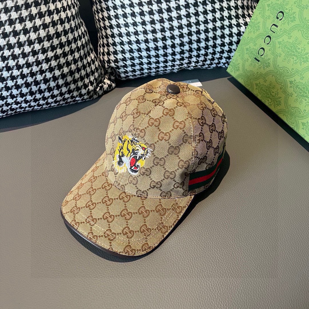 NO:223806,Package with box bags, Gucci new original single baseball cap, tiger head embroidery, 1:1 mold customization, heavy industry embroidery, details comparable to the counter, original canvas   top layer cowhide, excellent quality!  The first choice for handsome men and beautiful women, fashionable and versatile. The basic head circumference is 56, and the patch can be adjusted. Hats, straw hats, fishermen's hats, baseball hats, knit hats, hats, gucci, espadrilles, cowhides, hats19860909批 配盒子布袋,Gucci(古奇)新款原单棒球帽, 虎头刺绣,1:1开模订制,重工刺绣,细节可媲美专柜,原版帆布料 头层牛皮,质量超赞！帅男靓女首选,时尚百搭.基础头围56,贴片可调节.帽子草帽渔夫帽棒球帽针织帽,帽子,gucci,espadrilles,cowhide,hats,hat