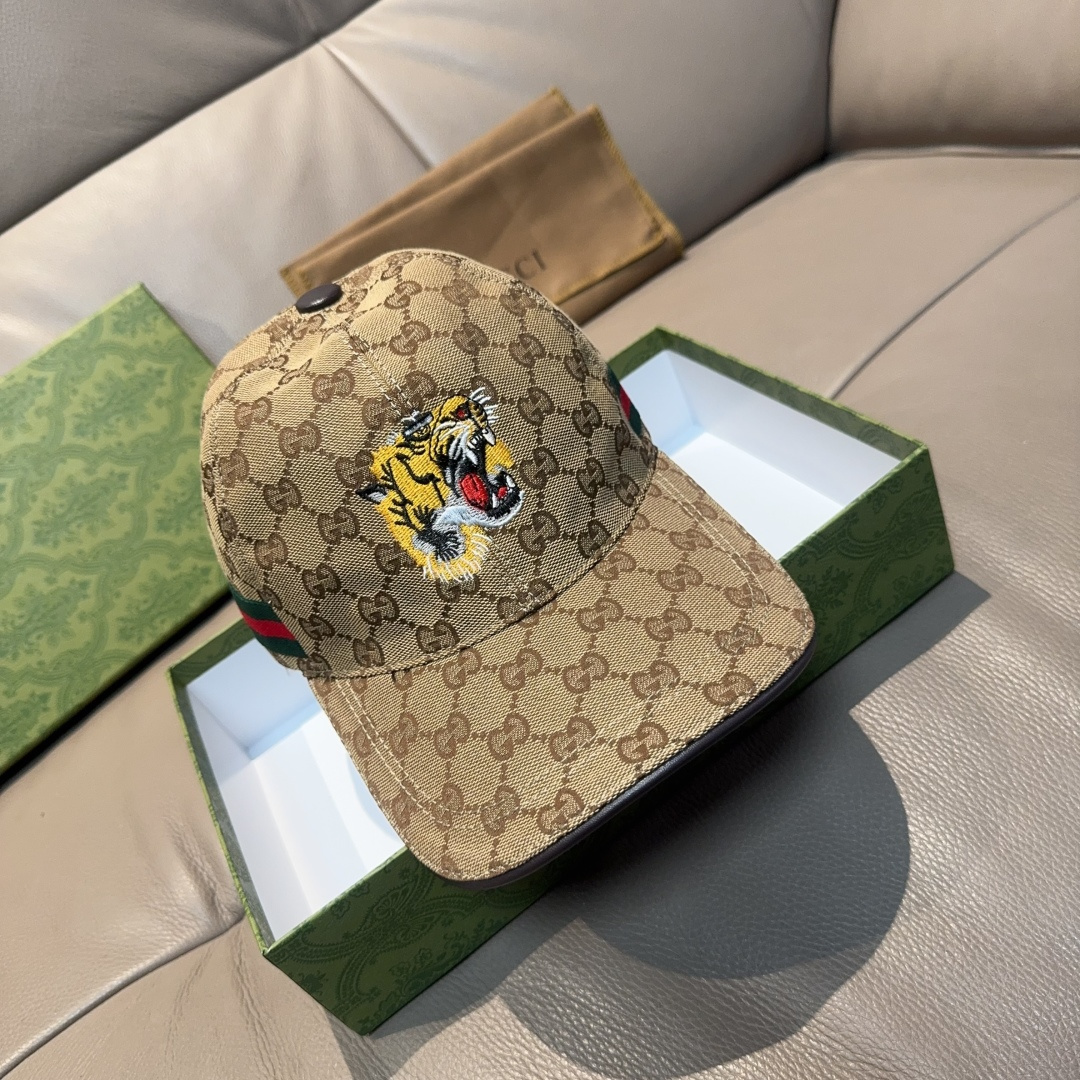 NO:357333,Package with box bags, Gucci new original single baseball cap, tiger head embroidery, 1:1 mold customization, heavy industry embroidery, details comparable to the counter, original canvas + top layer cowhide, excellent quality!  The first choice for handsome men and beautiful women, fashionable and versatile. The basic head circumference is 56, and the patch can be adjusted. Hats, straw hats, fishermen's hats, baseball hats, hats, gucci, espadrilles, cowhides, hats批 配盒子布袋,Gucci(古奇)新款原单棒球帽, 虎头刺绣,1:1开模订制,重工刺绣,细节可媲美专柜,原版帆布料+头层牛皮,质量超赞！帅男靓女首选,时尚百搭.基础头围56,贴片可调节.帽子草帽渔夫帽棒球帽,帽子,gucci,espadrilles,cowhide,hats,hat