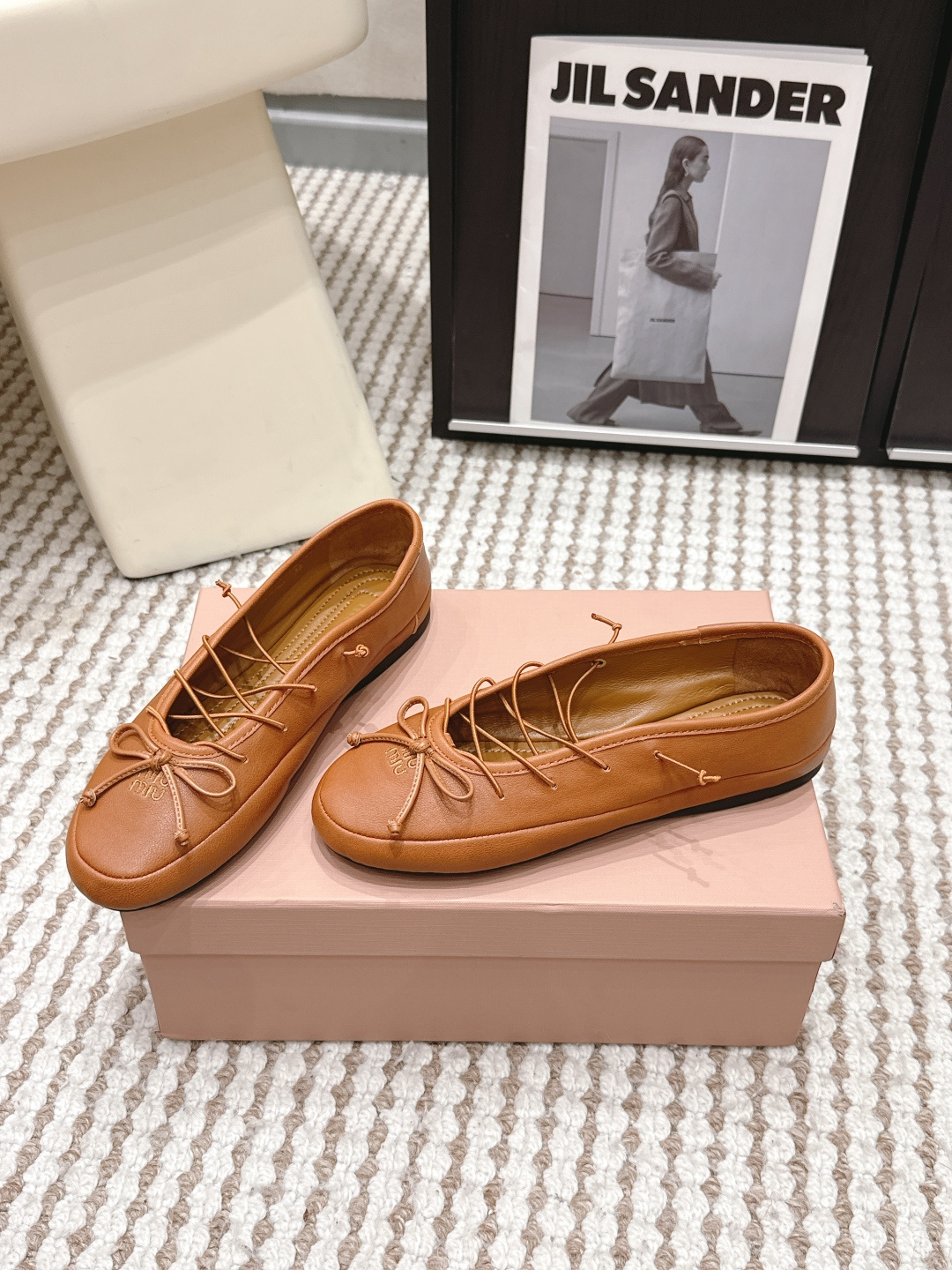 Балетки Miu Miu из кожи с бантом