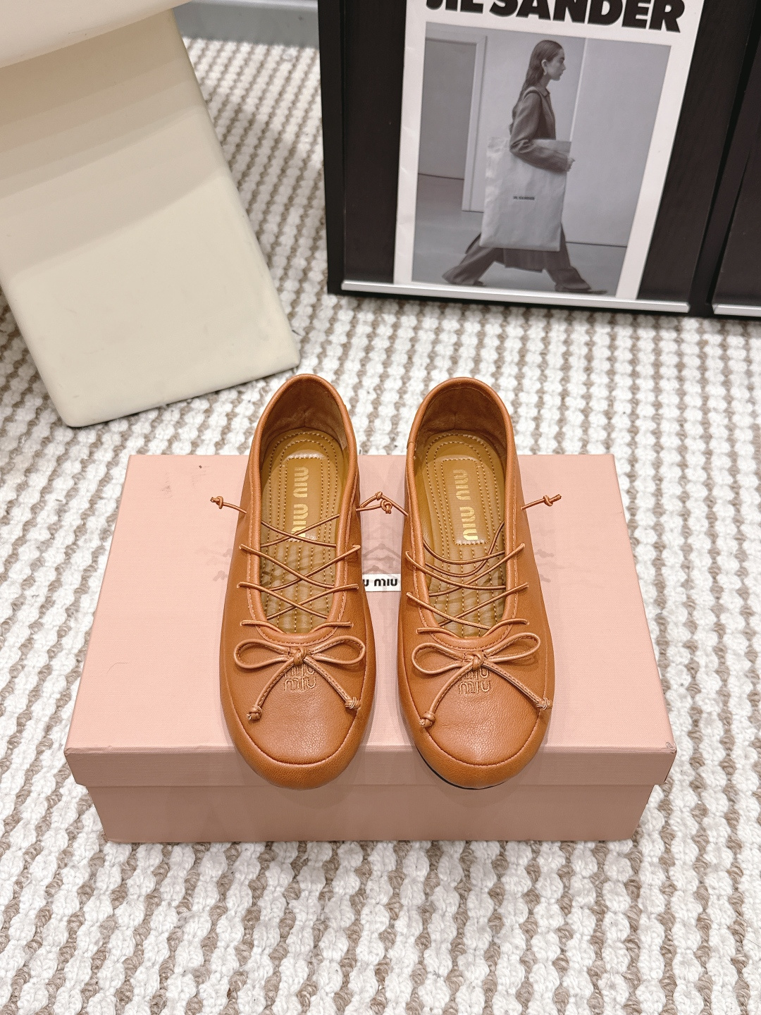 Балетки Miu Miu из кожи с бантом