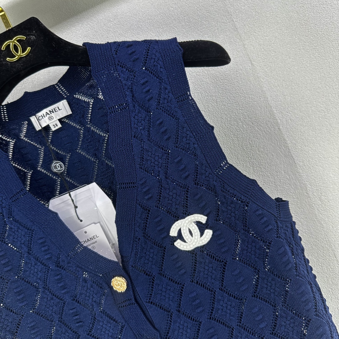 Chanel Women's Navy Knit Vest Sleeveless Top with CC Logo and Button Closure 2 cmp i1750779336107 7796 0 2