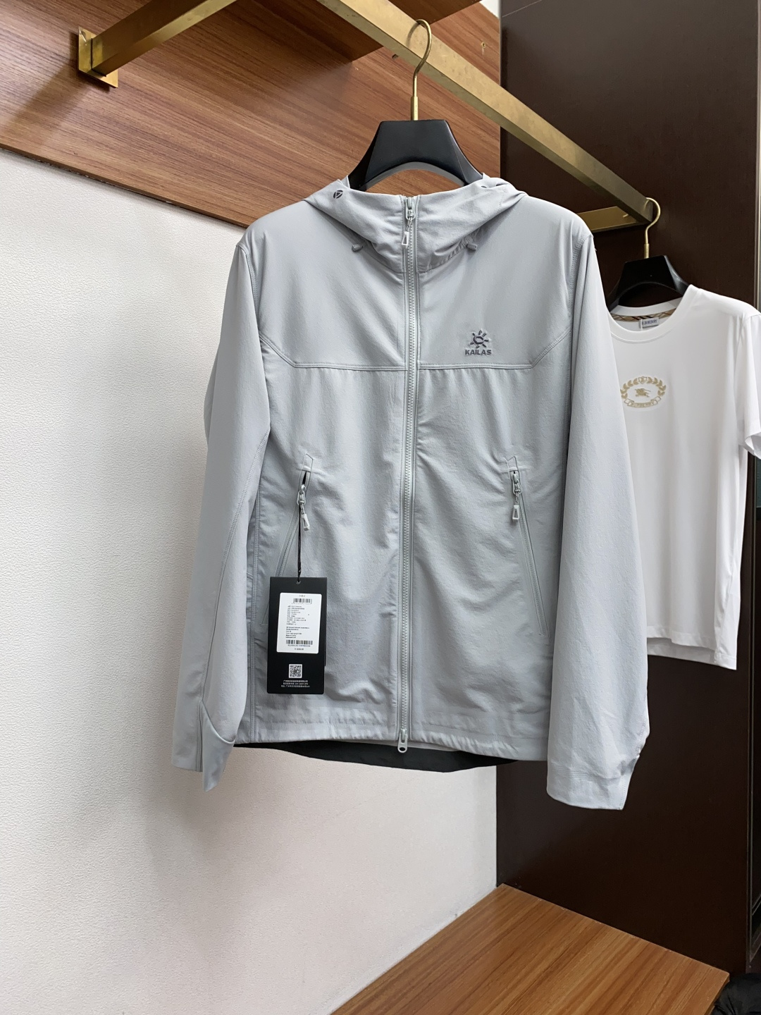 Title: KAILAS Mont-XPRO Hard-Shell Mountain Coat for Extreme Weather, Unisex, High Performance, 3D Design, Orange Raincoat.