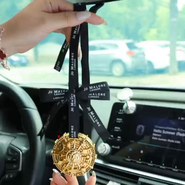 A Jo Malone sunflower car diffuser