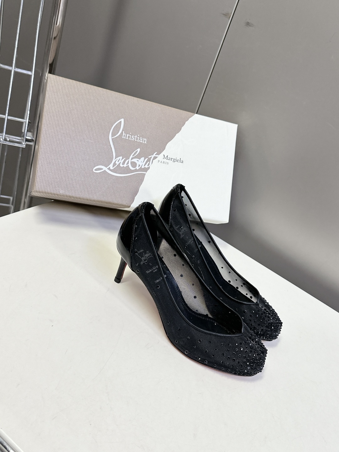 CL 红底鞋x Maison Margiela 分趾联名款高跟鞋
Maison Mar